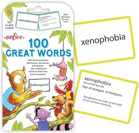 A book titled '100 Great Words', with flashcards surrounding it, one with the word 'xenophobia' and a definition, and another with the word 'cantankerous' and a note about pronunciation.