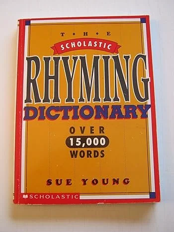 Cover of the book titled "The Scholastic Rhyming Dictionary" by Sue Young, featuring a yellow background with red, black, and purple text, and a red and blue border.