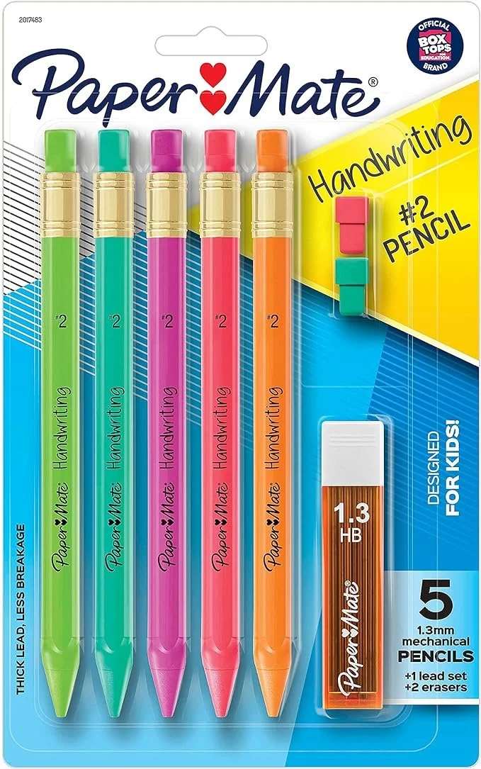 Package of Paper Mate handwriting pens with five colorful pens in green, blue, pink, red, and orange, a white eraser, and a pink and teal dual-ended pencil, designed for kids.