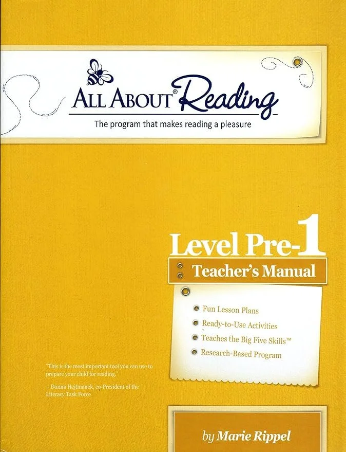 Cover of a teacher's manual titled 'All About Reading Level Pre-1,' featuring a yellow background, a label with a bee and a quill, and a list of program features such as fun lesson plans and research-based program.