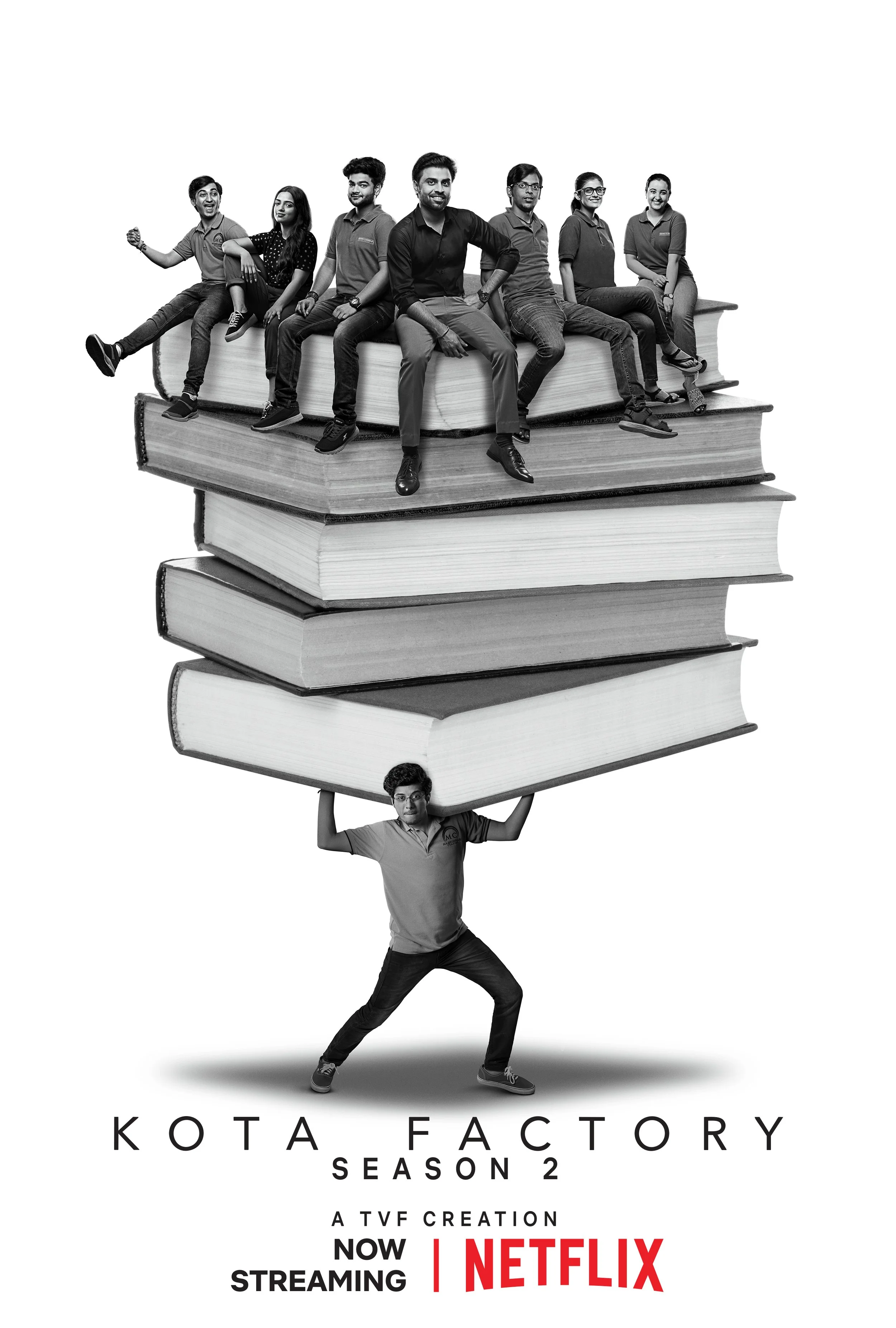 Promotional poster for "Kota Factory Season 2" featuring characters sitting on large books with text "Now Streaming on Netflix."