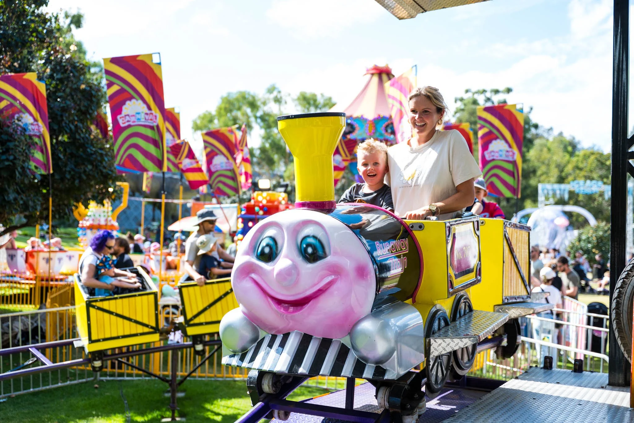 Mum and Son on Rollercoaster Train ride