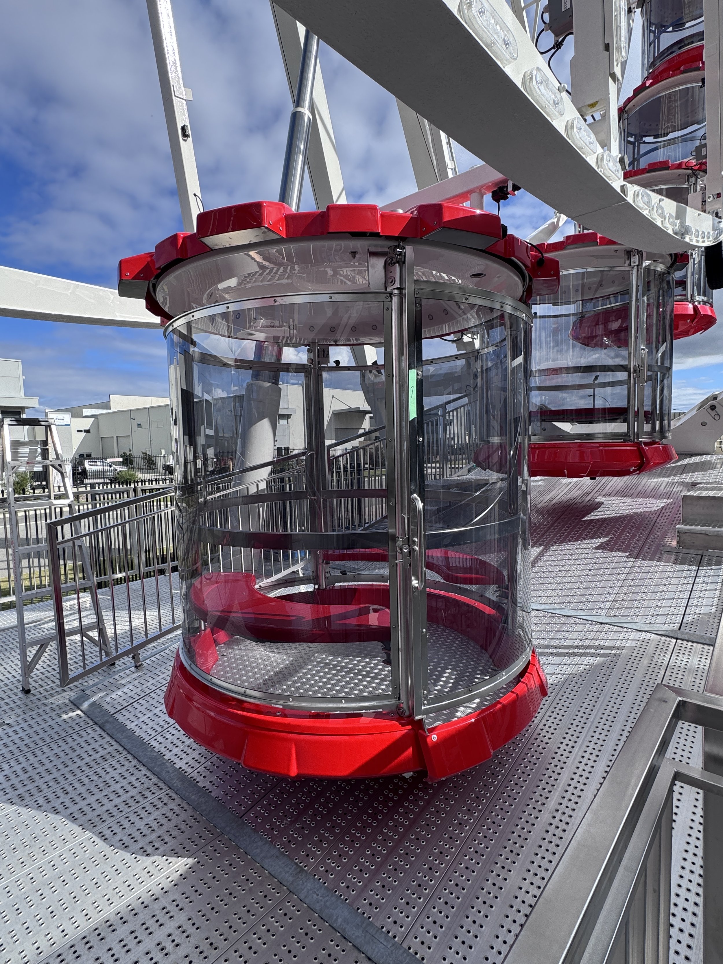 Red Gondola on Giant Ferris Wheel