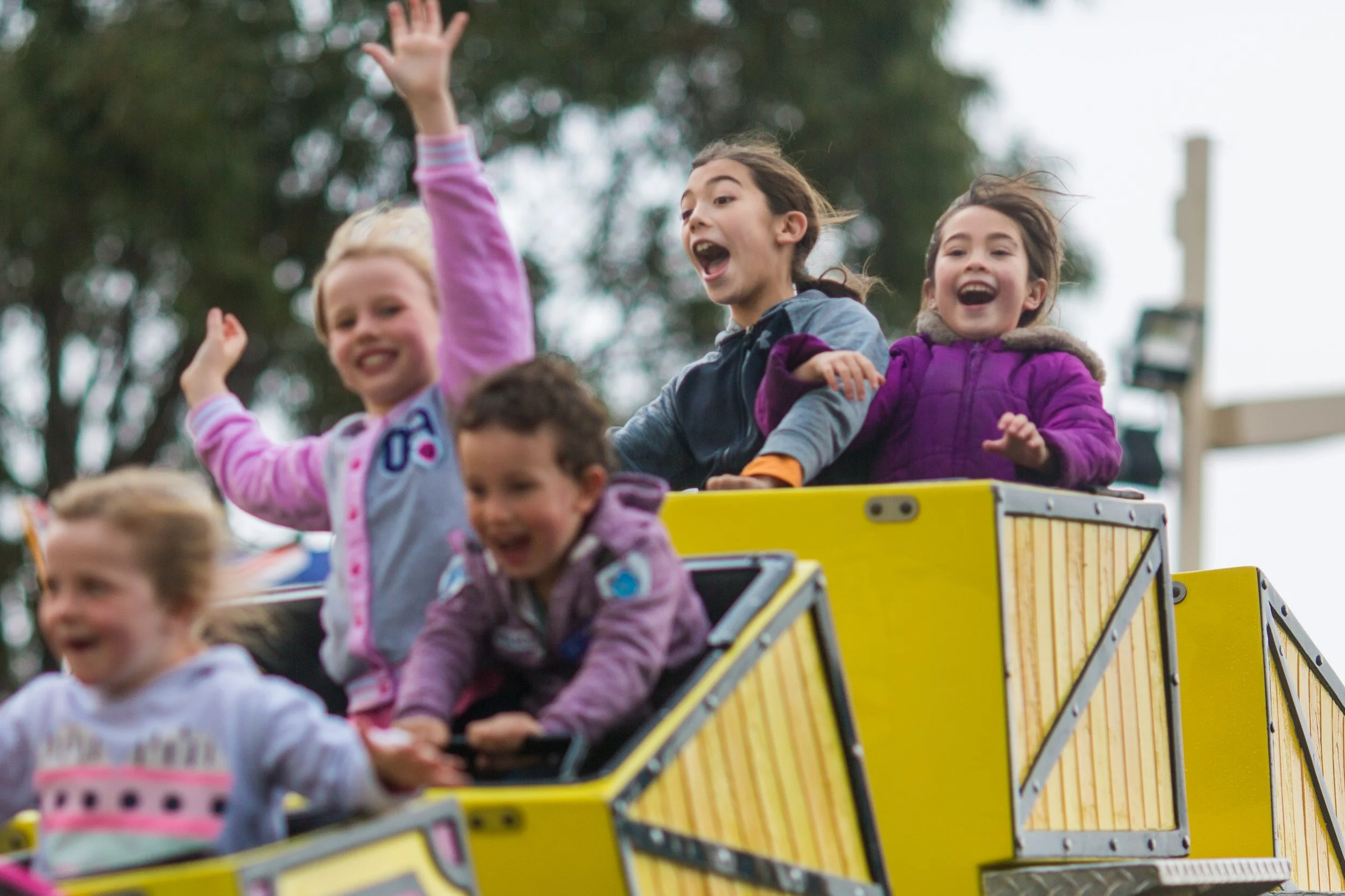 Kids on Rollercoaster Screaming and having fun
