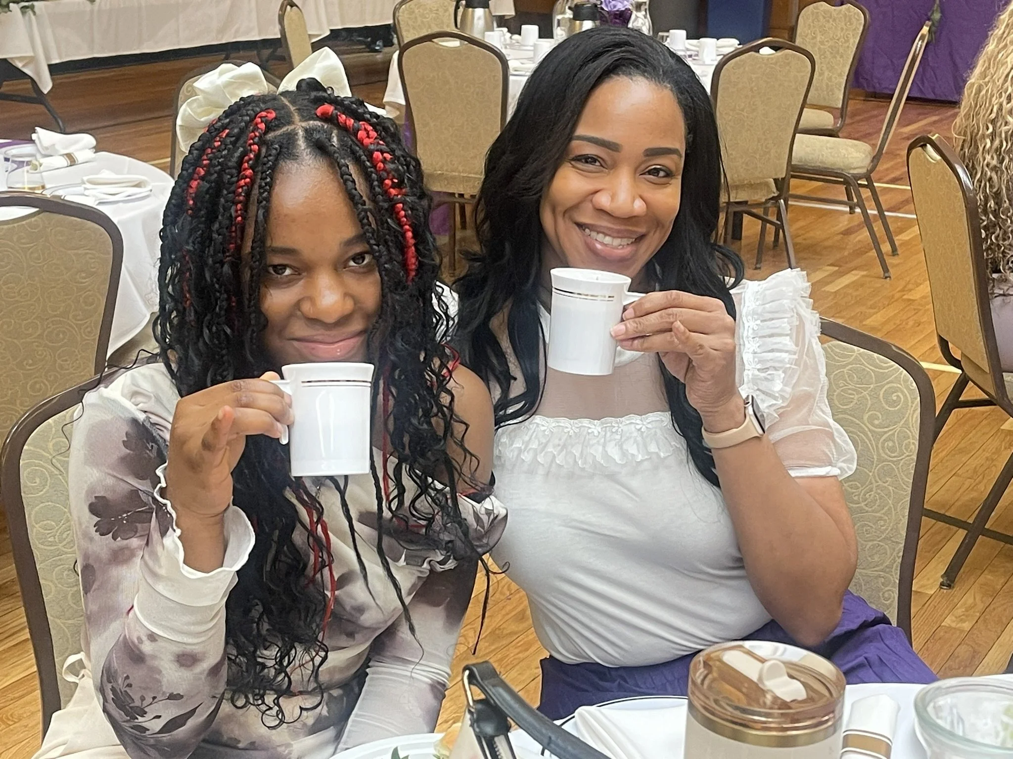 Lead Mentor and Girl having tea.JPEG