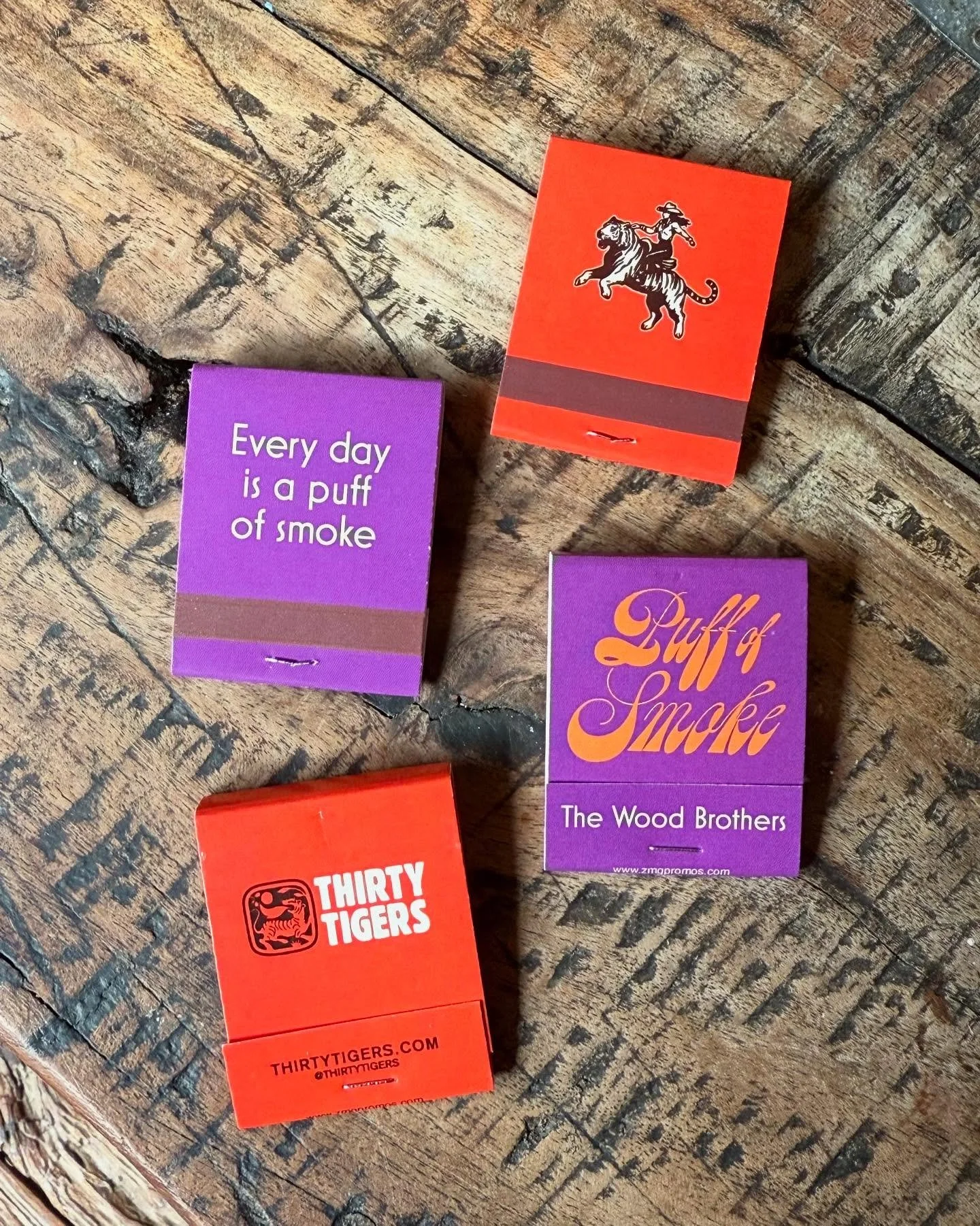 Spotted at #AMERICANAFEST a few weeks ago&hellip; grab your very own &lsquo;Puff of Smoke&rsquo; matchbook at the next show! 💜🧡

#thewoodbrothers #puffofsmoke #livemusic #liveontour #thirtytigers