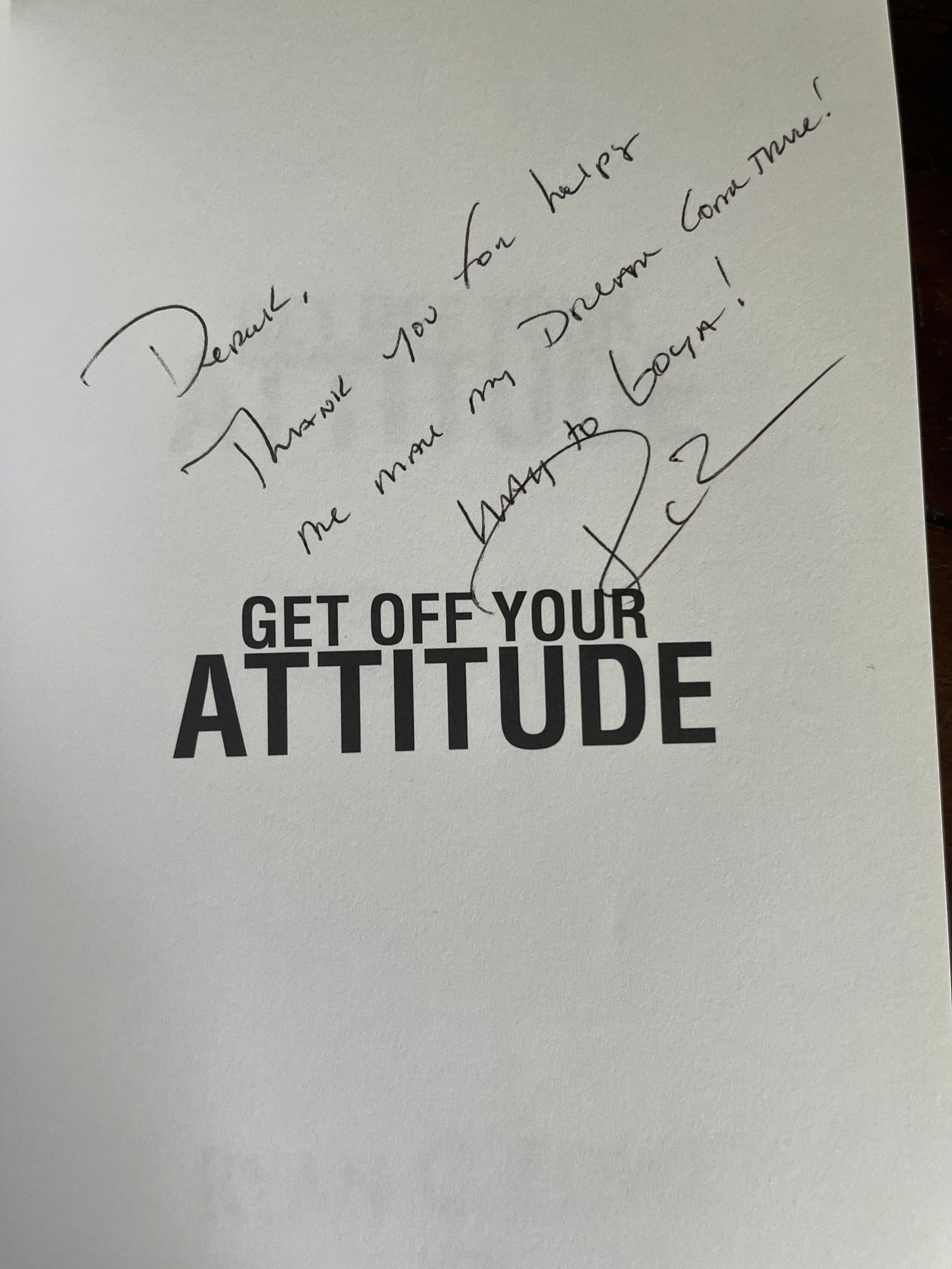 A handwritten note with the message: "Dena, thank you for helping me more my daughter come home!" and a printed phrase "GET OFF YOUR ATTITUDE".