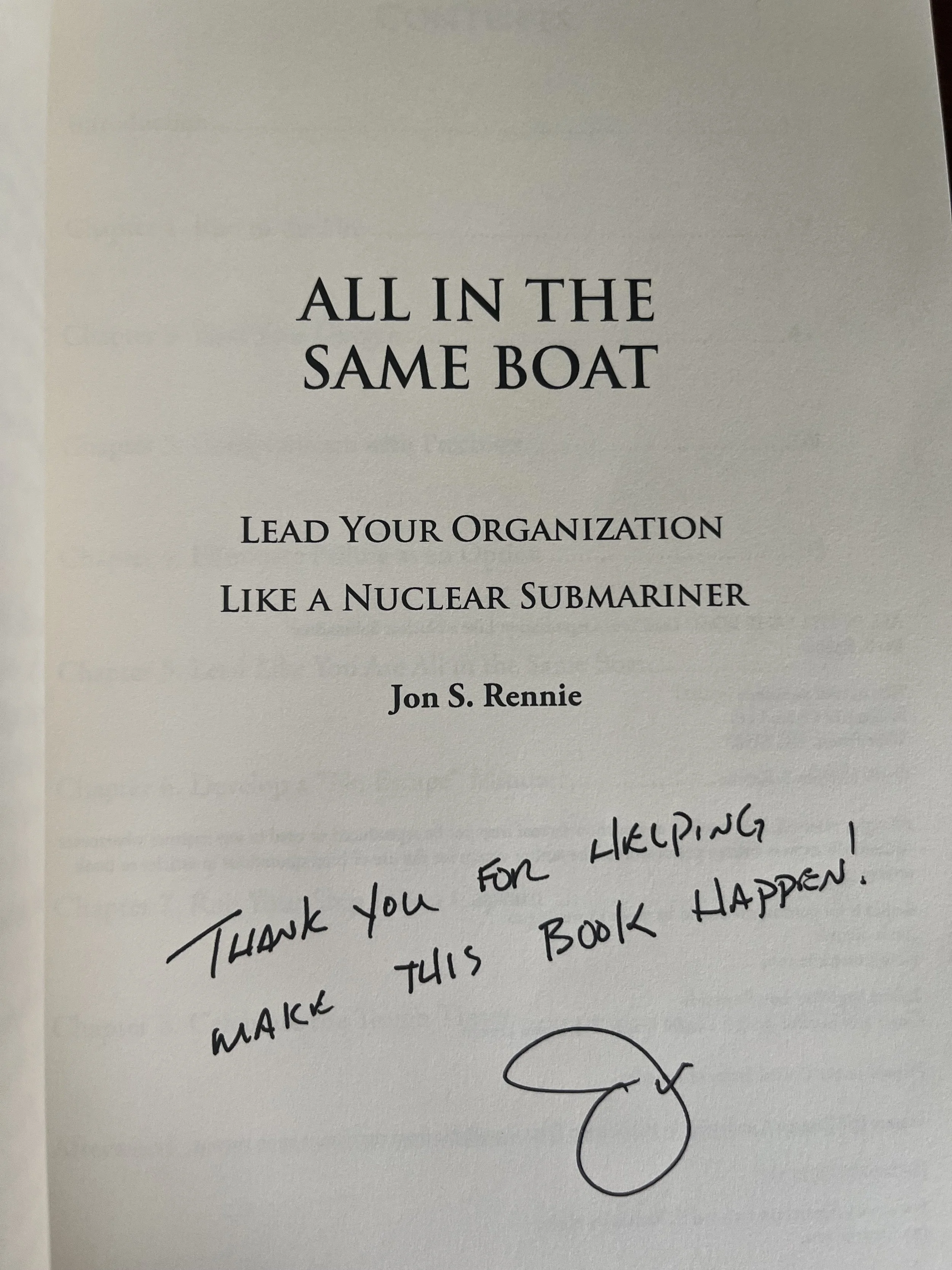 Open book with handwritten thank you note and signature on the title page. The note reads, 'Thank you for helping make this book happen!'