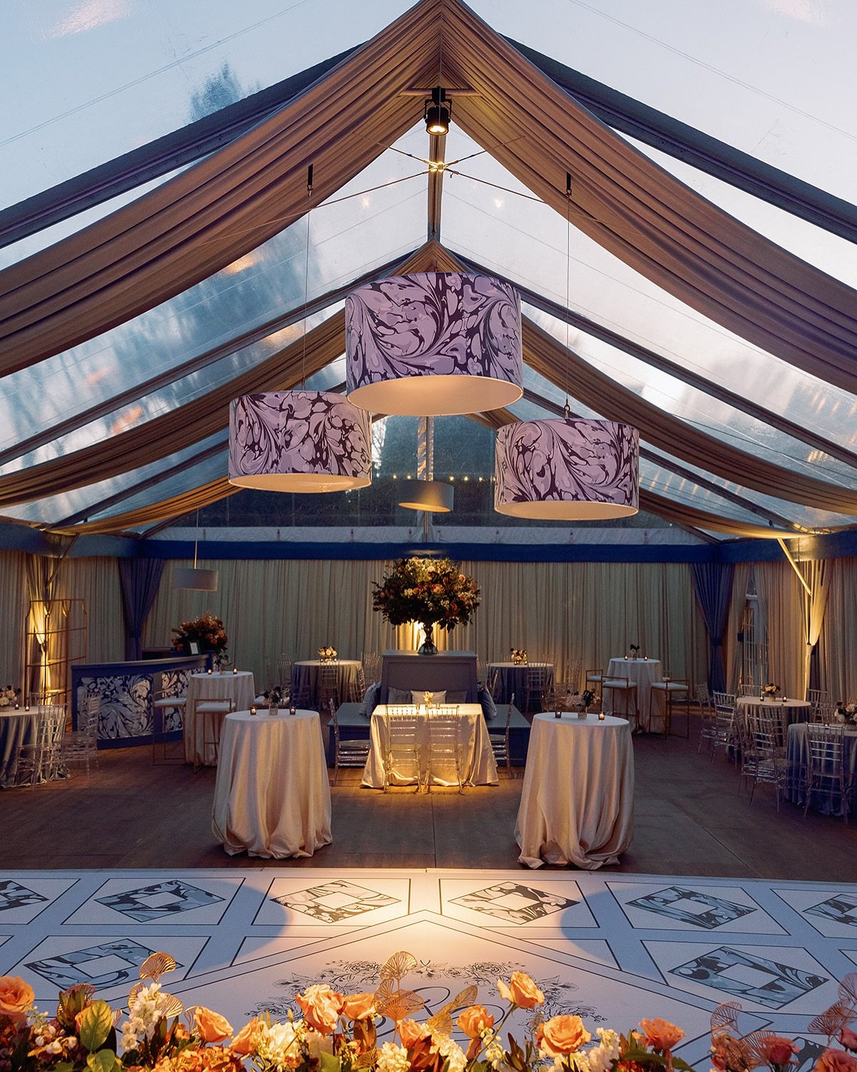A fresh take on the tented reception: custom fixtures, tailored textiles, and a dance floor built to bring the night to life.

Planning, Design &amp; Production (including stationery &amp; floral design): @rroseevents
Photography: @sarahbradshawphoto
