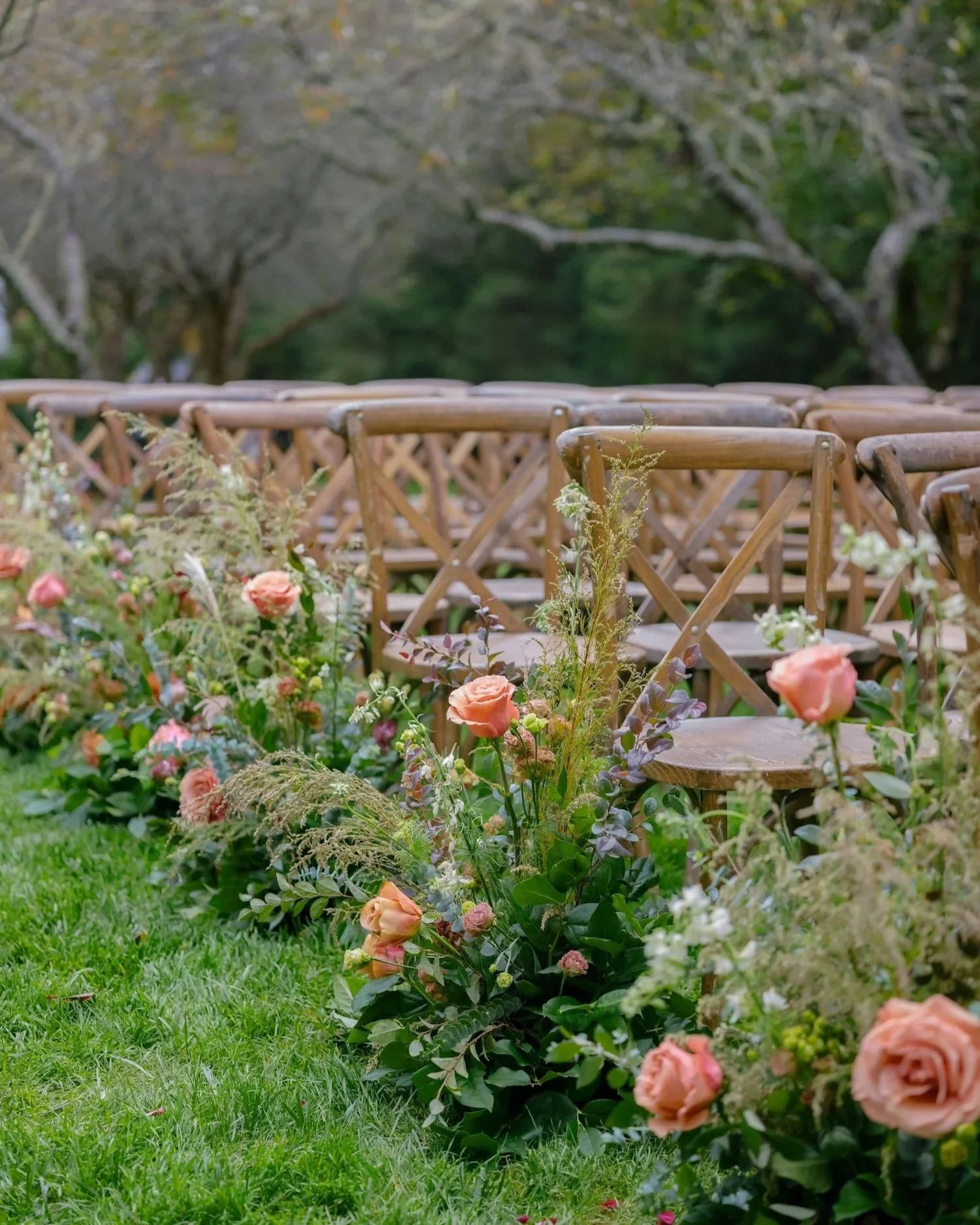  Al fresco ceremony aisle floral design by Rebecca Rose Events at Old Edwards Inn 