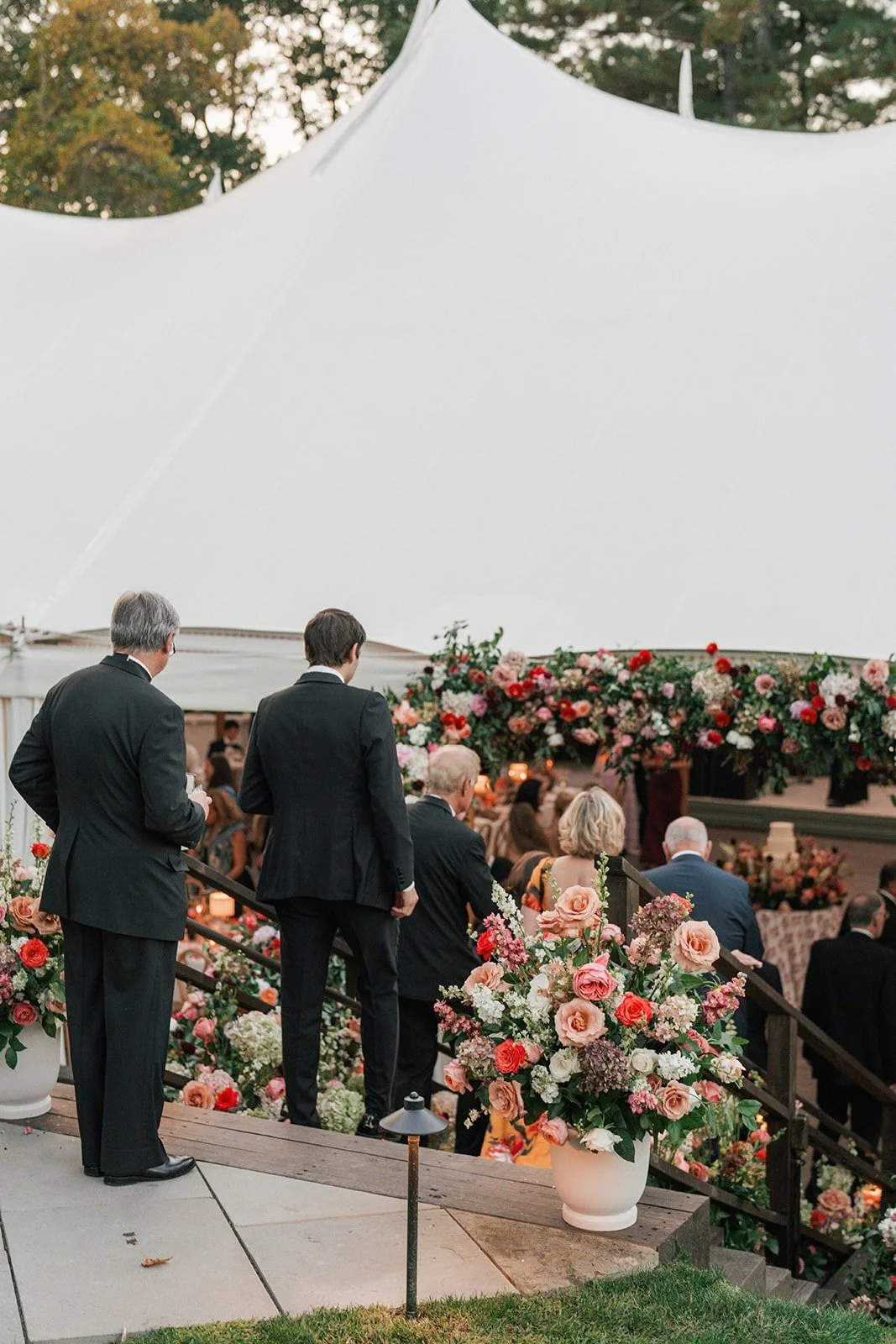 loral tent entrance installation at sailcloth tented wedding designed by Rebecca Rose Events