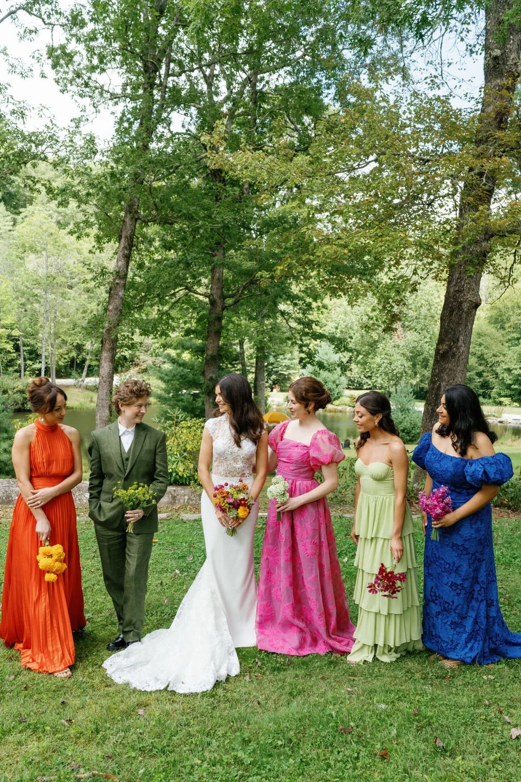 Colorful floral design for lakeside wedding ceremony at Flat Mountain Farm Highlands NC