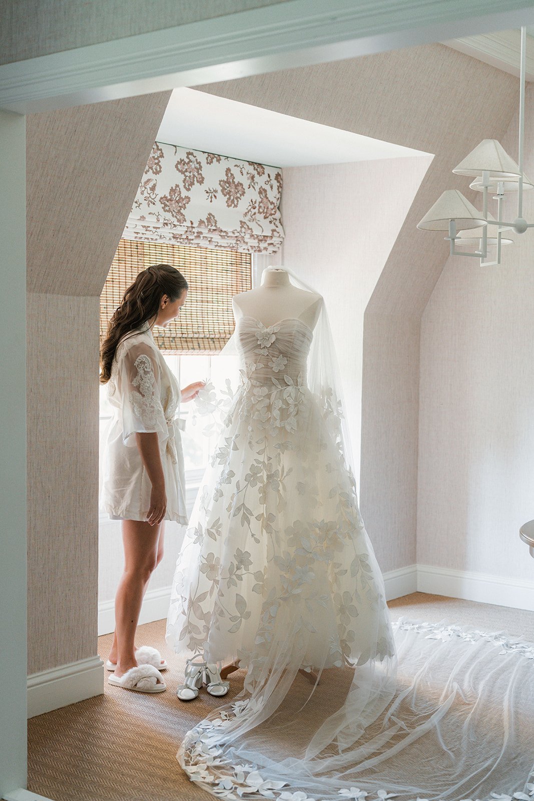 A bride and her Oscar de la Renta gown for a wedding at the Mayflower Inn