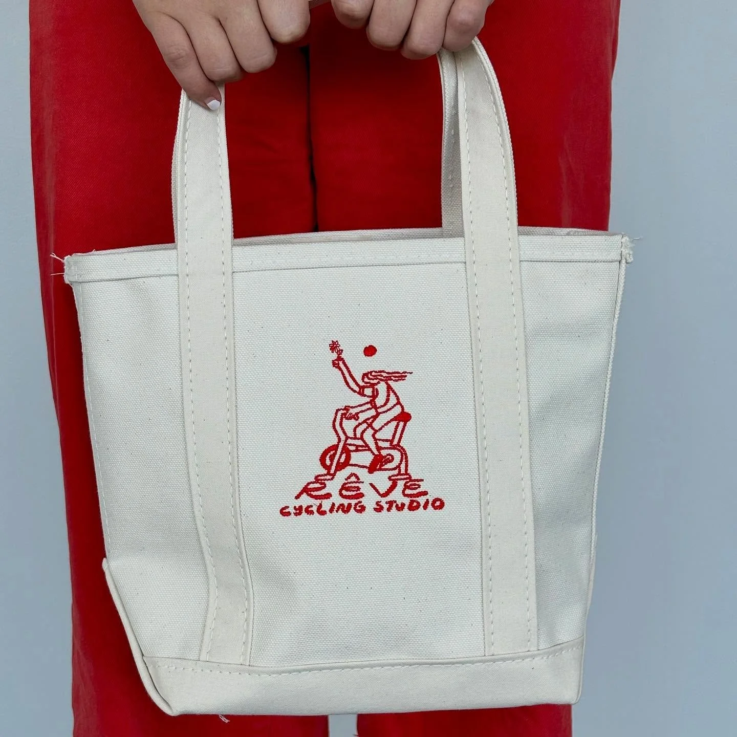 All is merry and bright! ✨ 

Cozy socks are on the shelves now, and totes arrive December 6th. Want to add a little something extra? Customize yours with a bag charm at our in-studio pop-up with @scribblesanddoodlez on 12.6!