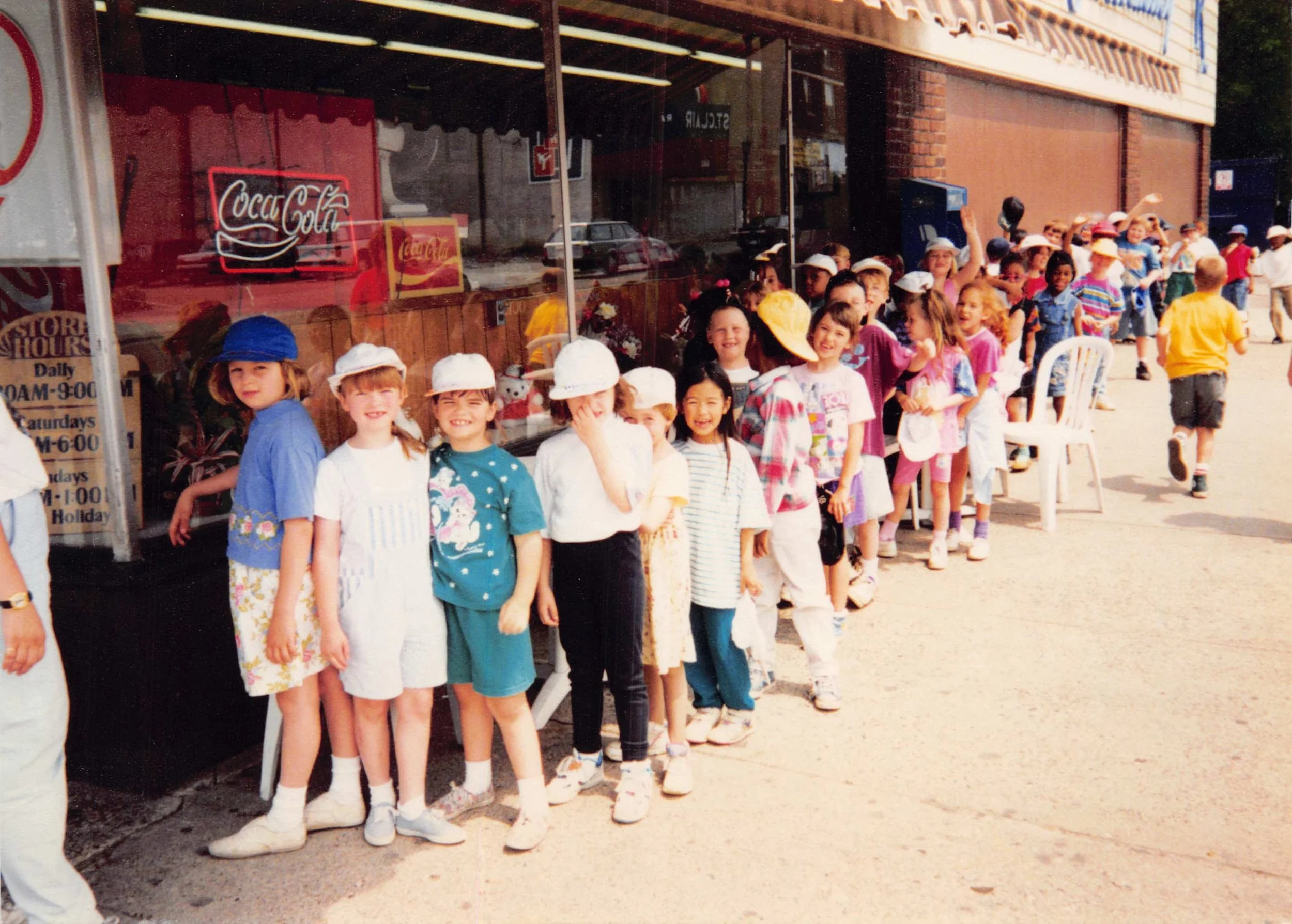 Local elementary school students line up for scoops on the last day of school