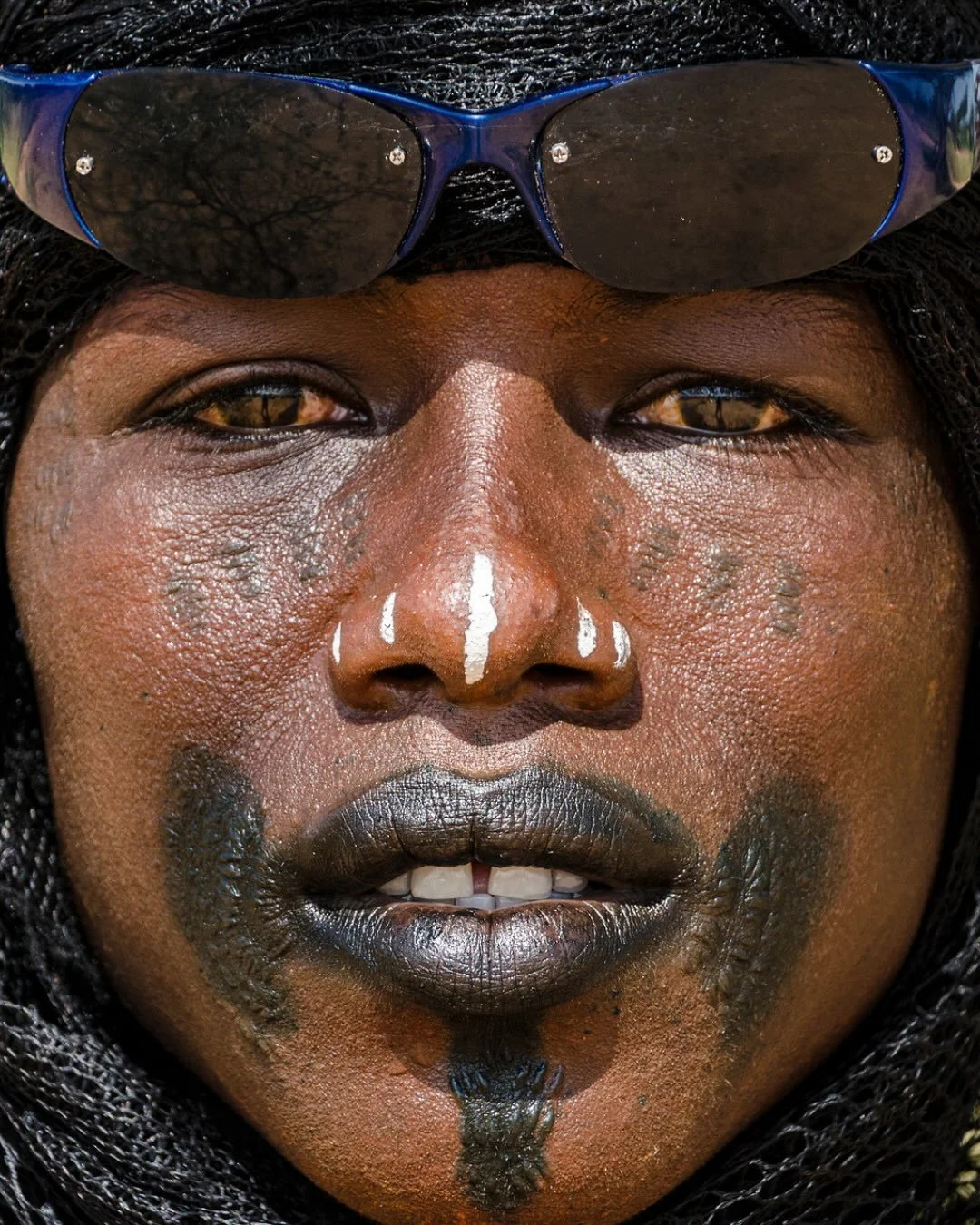✨ Honorable Mention &mdash; Modern Muse Exhibit
&ldquo;Handsome Bororo Man&rdquo; by @lynn_doran 

A portrait that meets your gaze without hesitation. Strength, beauty, and story etched in every line. A reminder that the human face is its own landsca
