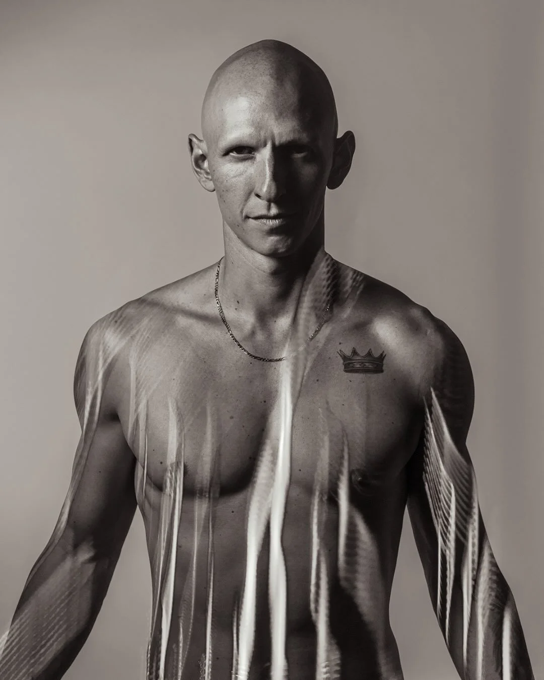 📷 Beauty Illuminated Exhibit
&ldquo;Nico Untitled 1&rdquo; by John Ciambriello @john_ciambriello 

Light becomes a language
a quiet script written across skin,
revealing both the architecture of the body
and the resolve living beneath it.
Shadow sha