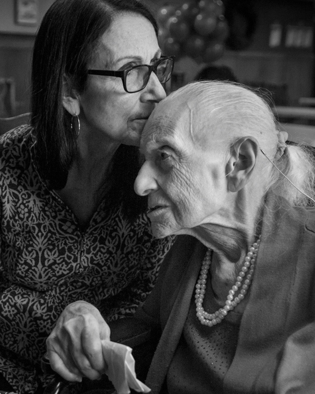 📷 Memory in Moment Exhibit
&ldquo;Untitled (Grandma Cookie)&rdquo; by Michael McFadden @mcfaddenphoto 

A quiet exchange of closeness and care &mdash; memory held not in words, but in touch, breath, and the gentle weight of time shared between gener