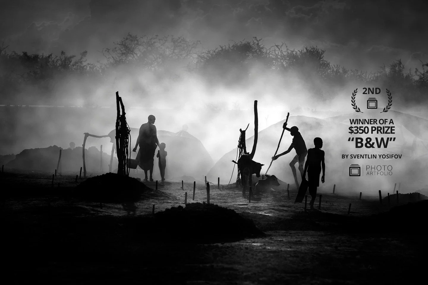 📷 B&amp;W: The Poetry of Light &amp; Shadow
2nd Place &ldquo;The Silhouettes of Mundari&rdquo; 
by Sventlin Yosifov @svetlin_yosifov 

Emerging from smoke and light, the figures stand in quiet rhythm. Gesture replaces detail, and presence speaks lou