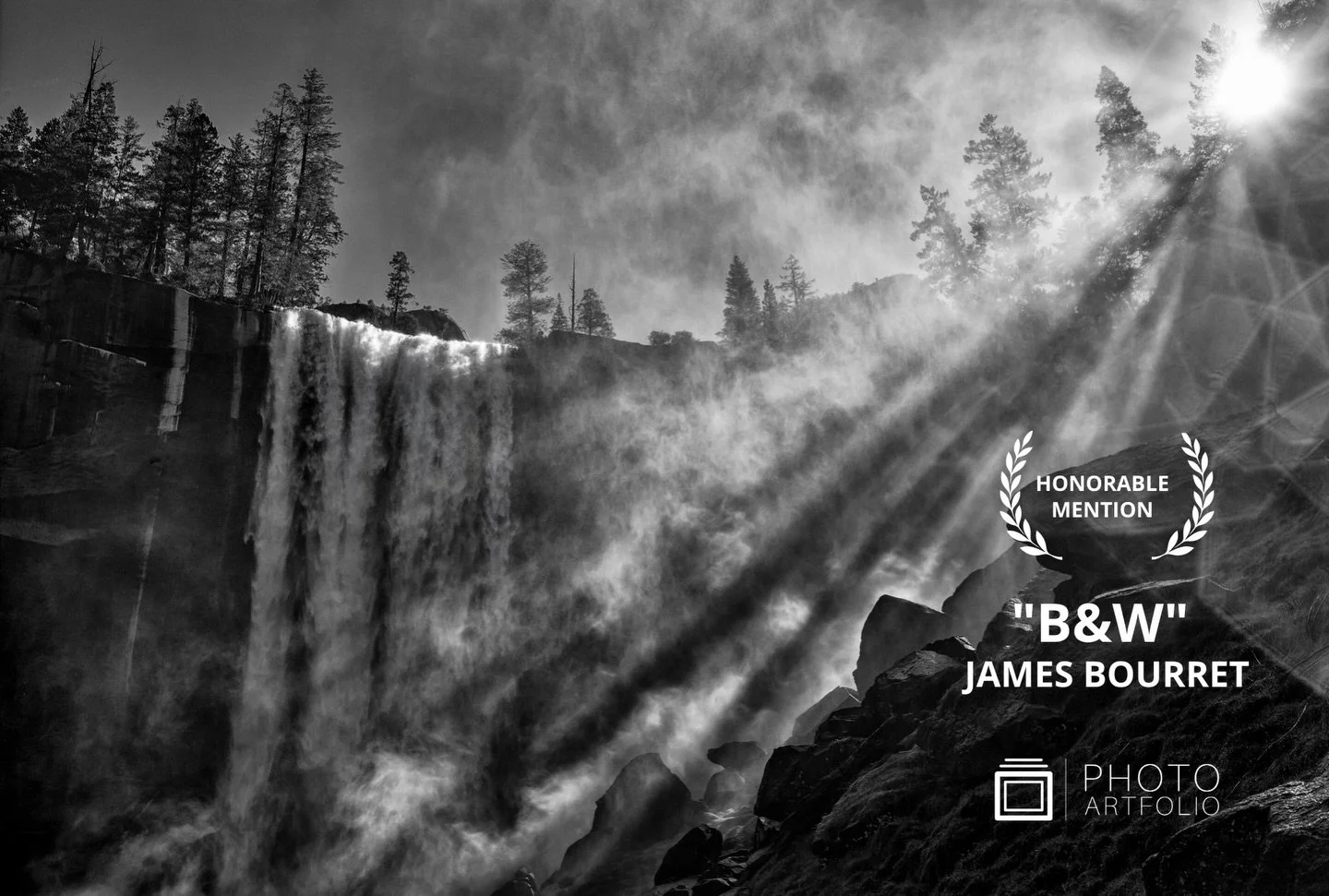 📷 B&amp;W: The Poetry of Light &amp; Shadow
Honorable Mention
&ldquo;Mist Trail&rdquo; by James Bourret @mountainimages1 

Light fractures through mist as water falls with quiet force. Shadow grounds the landscape while brightness dissolves it, mome
