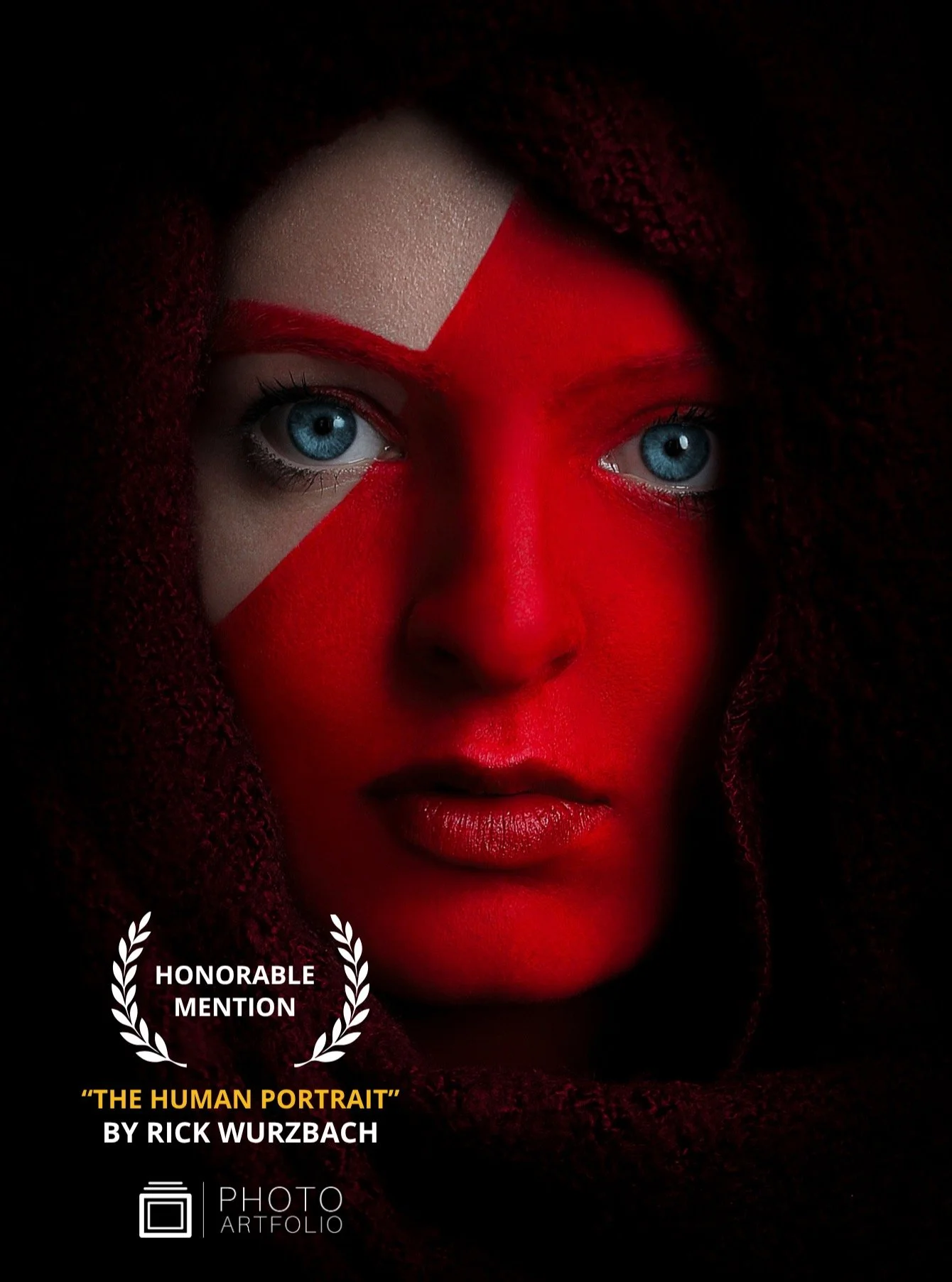 📷 THE HUMAN PORTRAIT
Honorable Mention
&ldquo;Staring in Red&rdquo; by Rick Wurzbach

A gaze that stops you.
Color that refuses to whisper.

Red takes over, bold, immersive, almost confrontational&hellip; and yet the eyes remain calm, clear, present