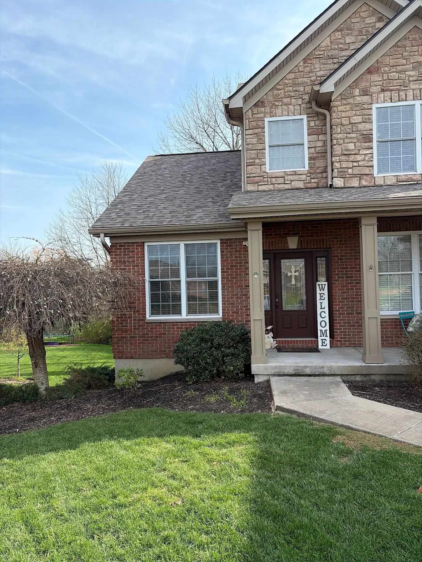 A front yard view of a customer's home in Union, Kentucky right after Riegler Contracting installed a new roof.