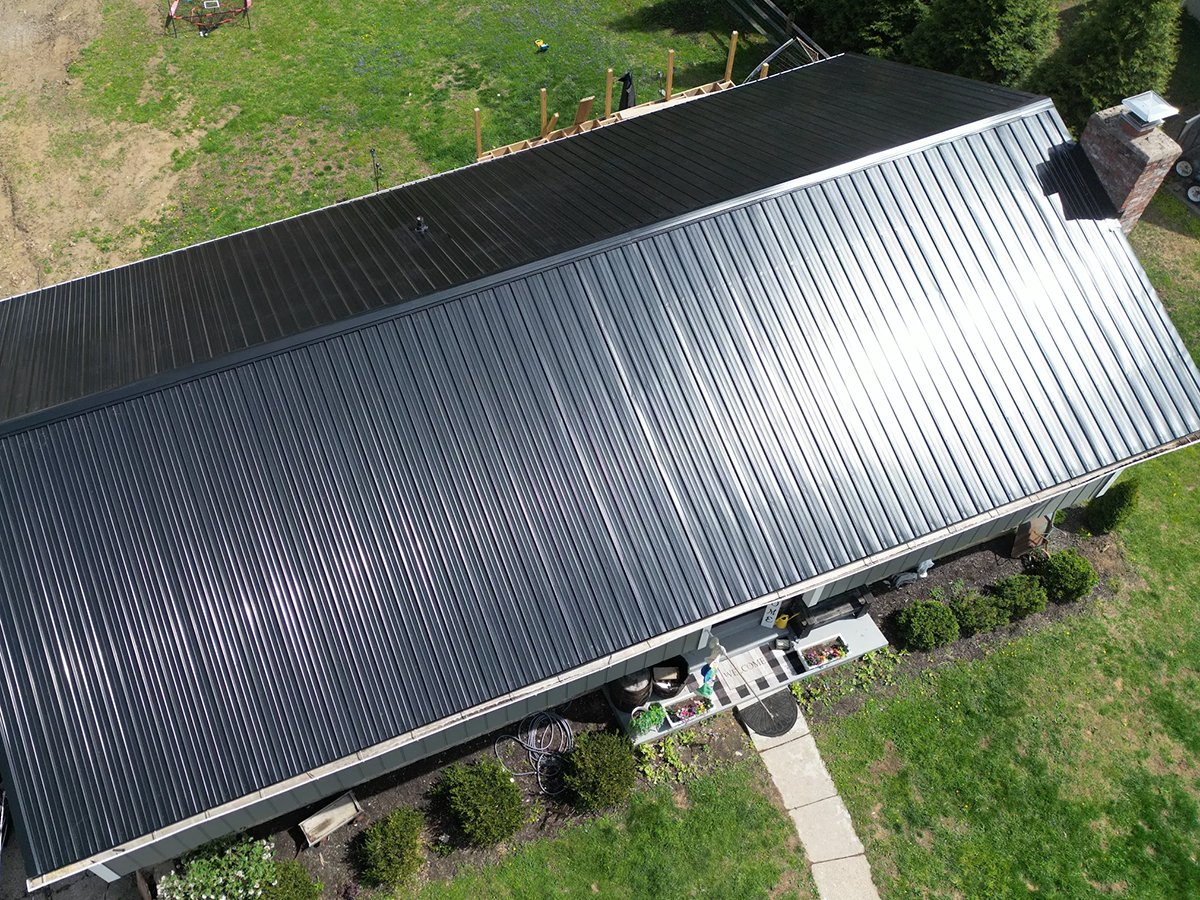 An aerial photo of a new black metal roof installed by Riegler Contracting in the Greater Cincinnati, Ohio area.