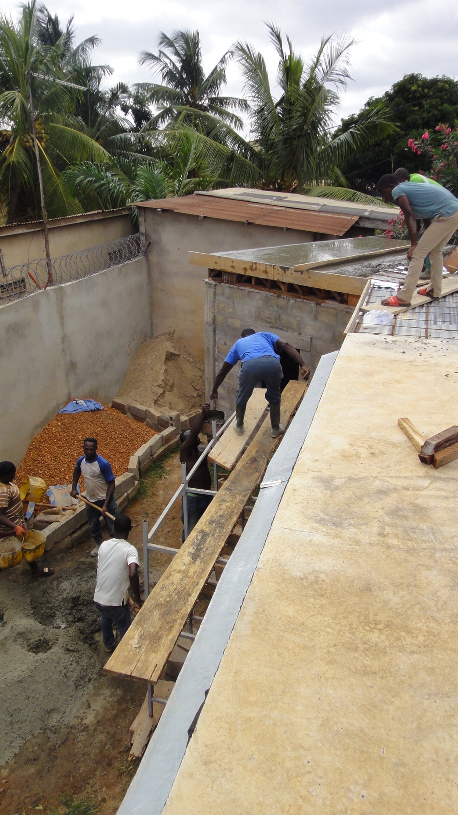 Volunteer house 2nd floor slab work.JPG