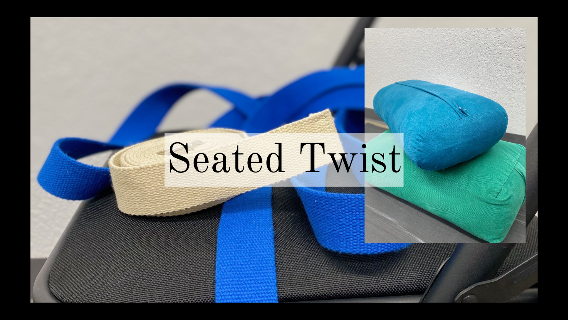 Close-up of folded fabric straps on a black textured surface with a translucent overlay of the words "Seated Twist" in black text.