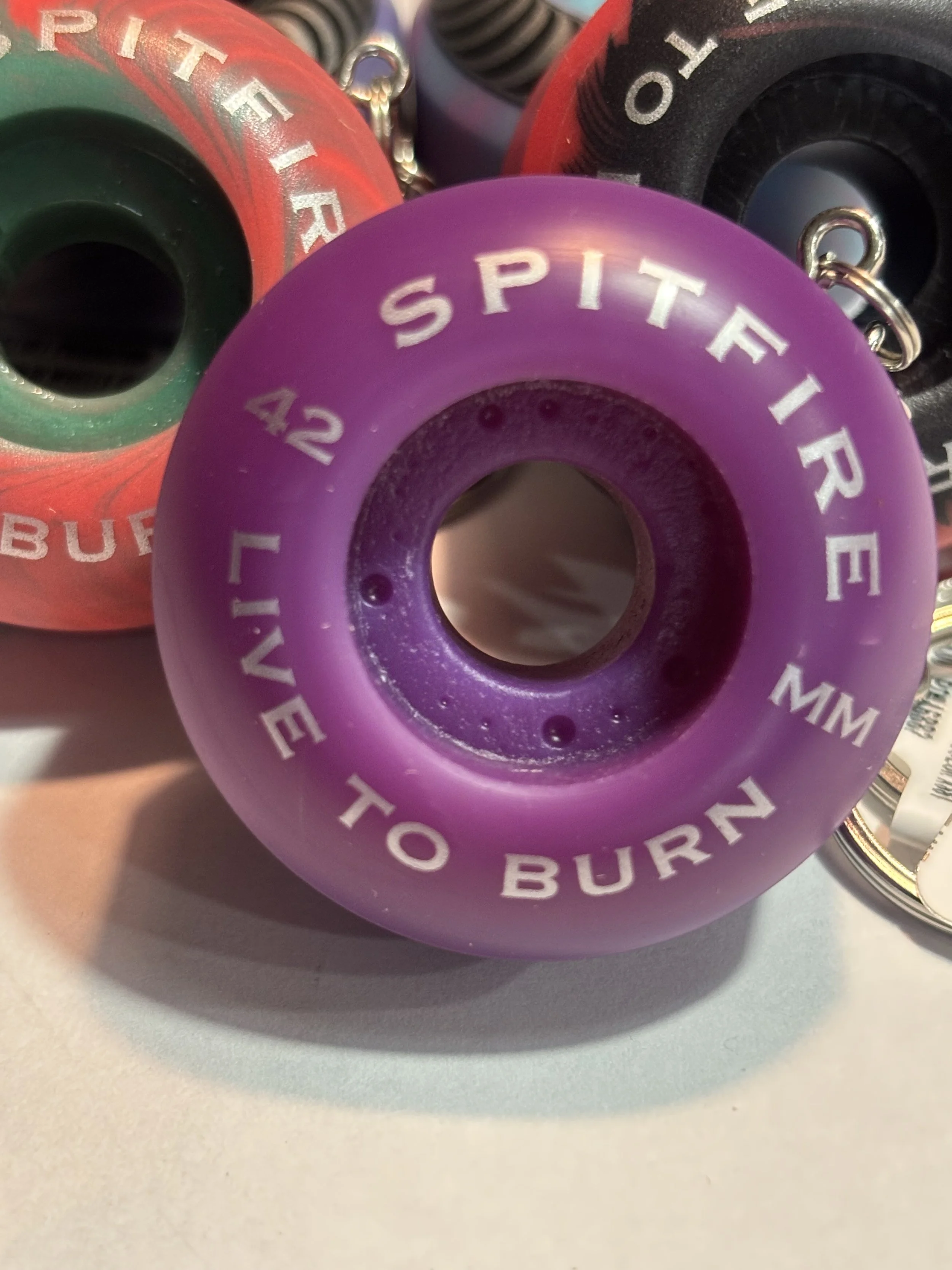 SPITFIRE SWIRL ASSORTED KEYCHAINS BRIGHT PURPLE