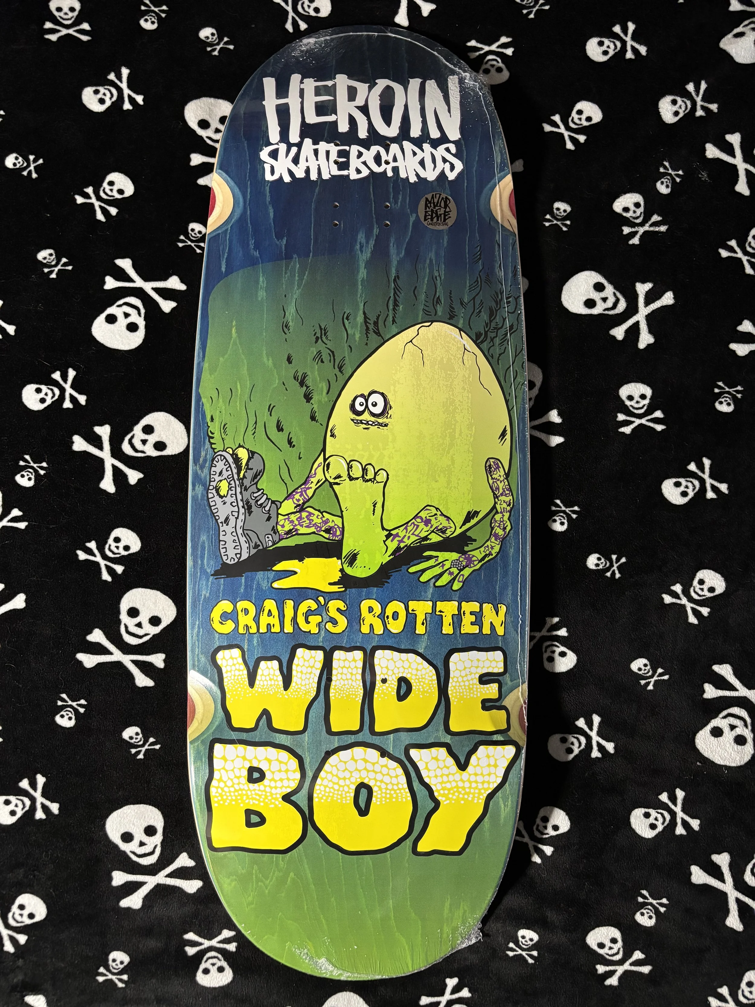 HEROIN~ CRAIG QUESTIONS ROTTEN WIDE BOY BLUE SKATEBOARD DECK
