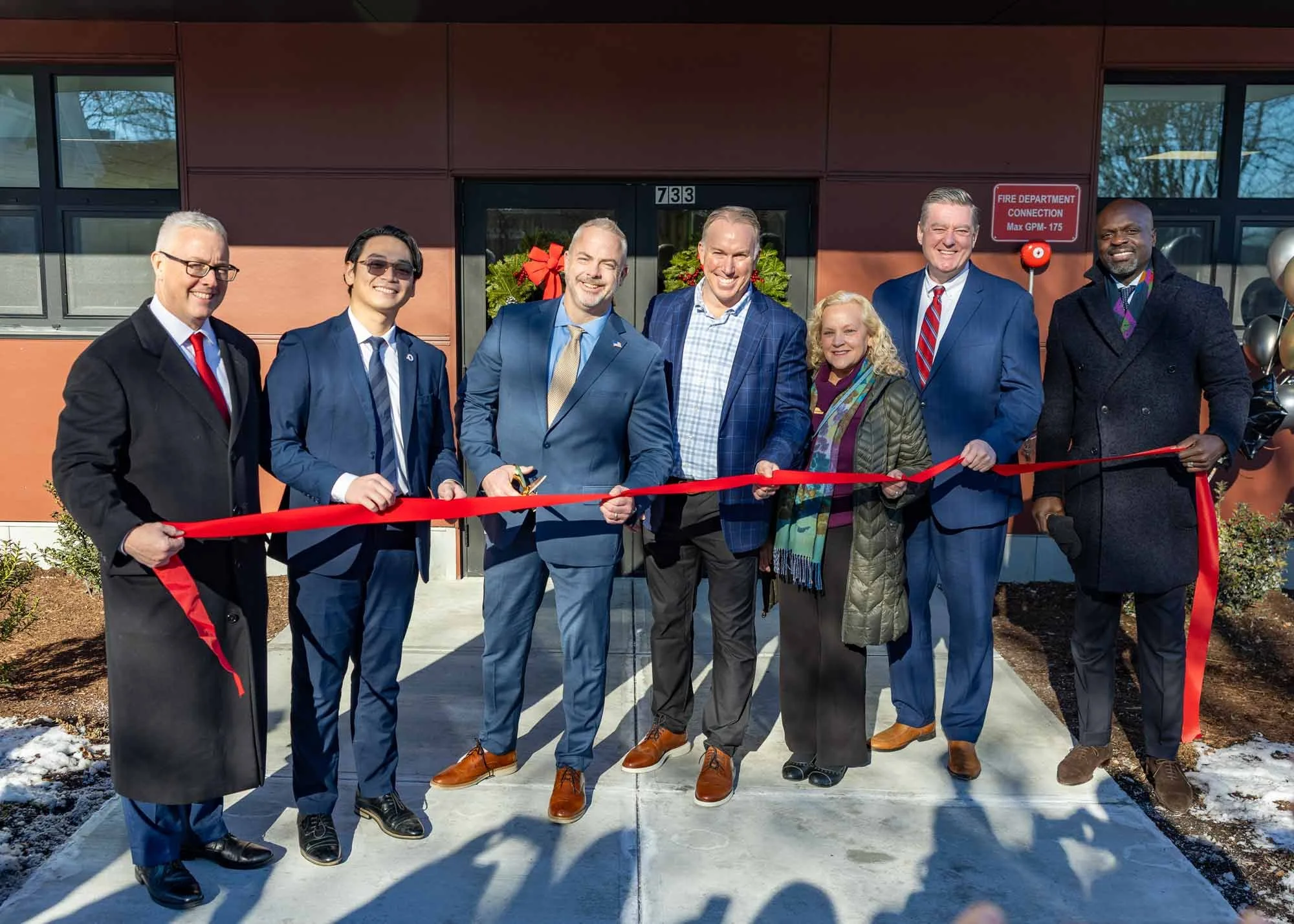 Nancy-McCafferty_Ed-Augustus_ribboncut_733Broadway_Lowell_121625_CityOfLowell-(1).jpg