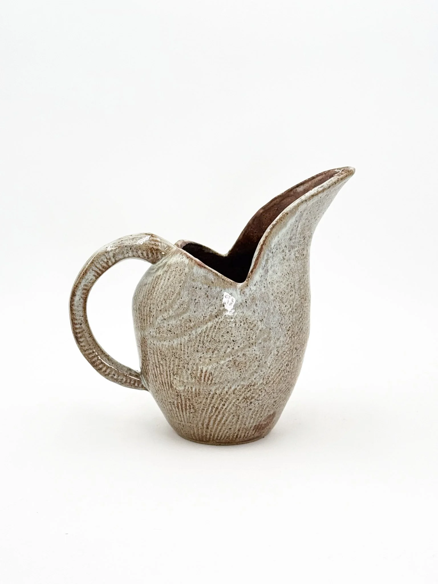 Scallop bird pitcher
