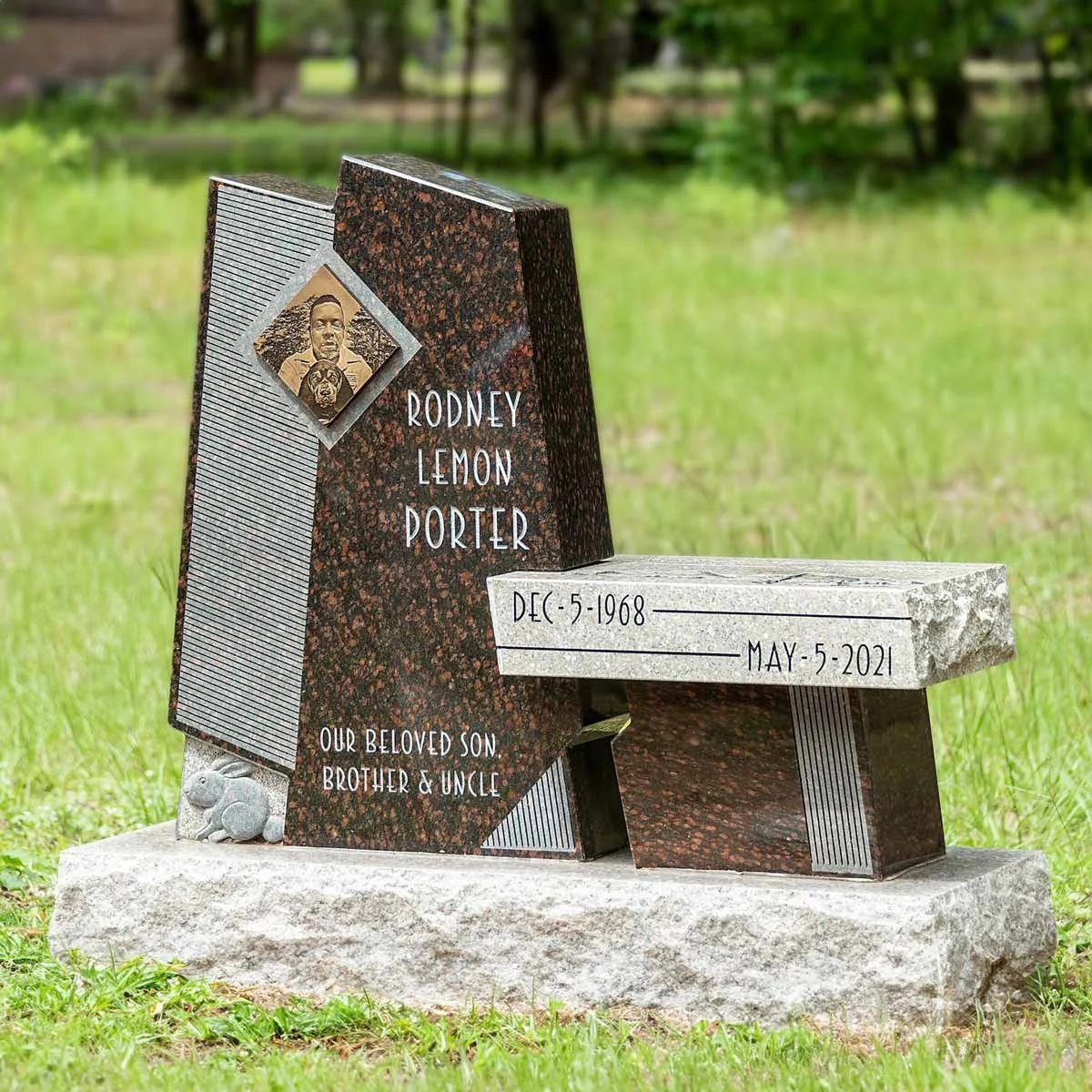 Gravestone memorial for Rodney Lemon Porter with a photo of him, dates December 5, 1968 to May 5, 2021, and a small mouse figurine at the base.