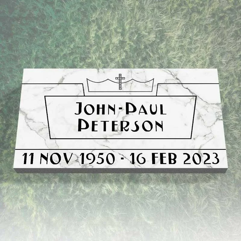 A grave marker with the name John-Paul Peterson, birth date November 11, 1950, and death date February 16, 2023, on a grassy background.