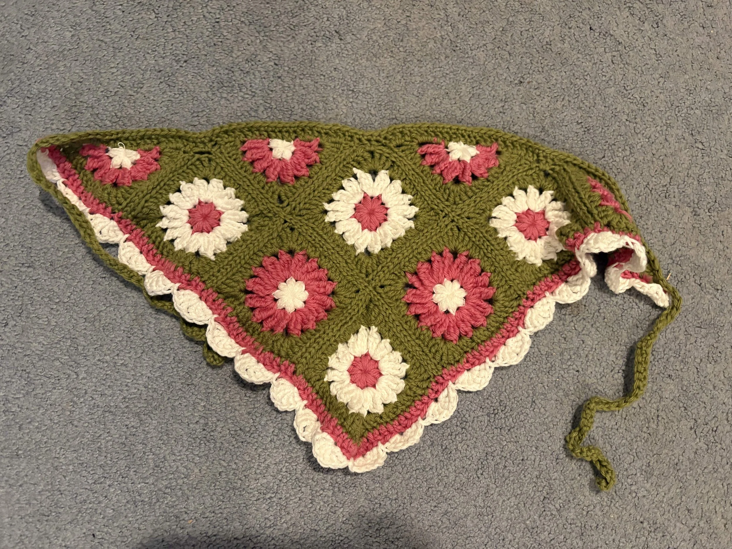 2025 - A flower granny square bandana; with yarn bought in Italy and finished on a train in Germany