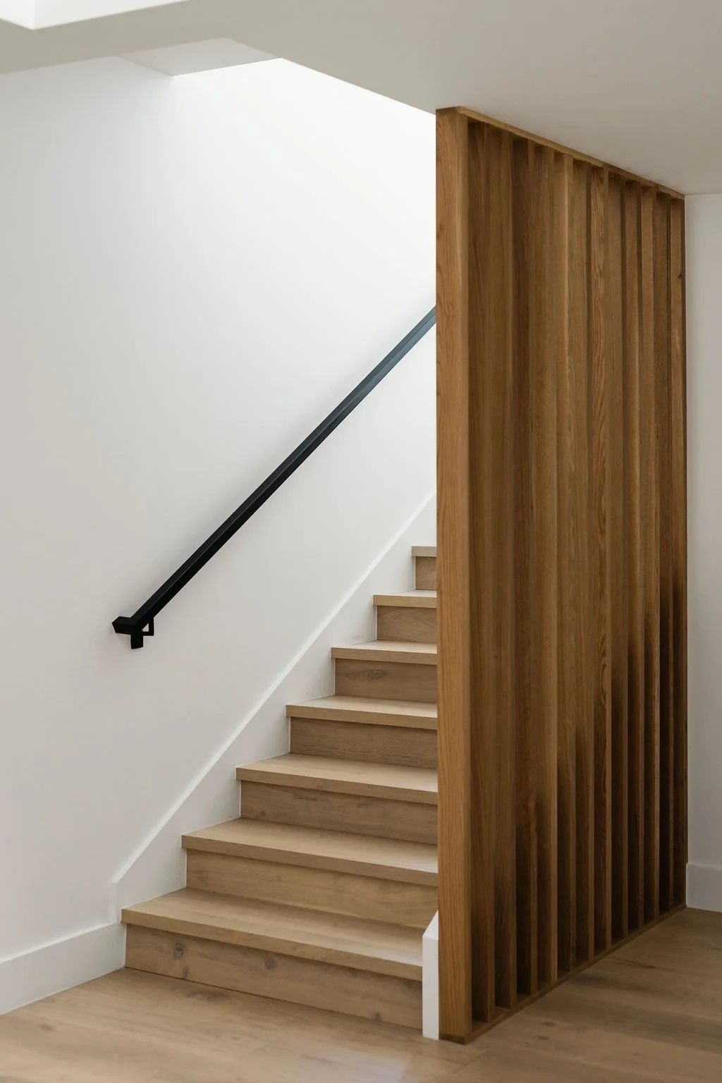 White oak staircase with slat wall