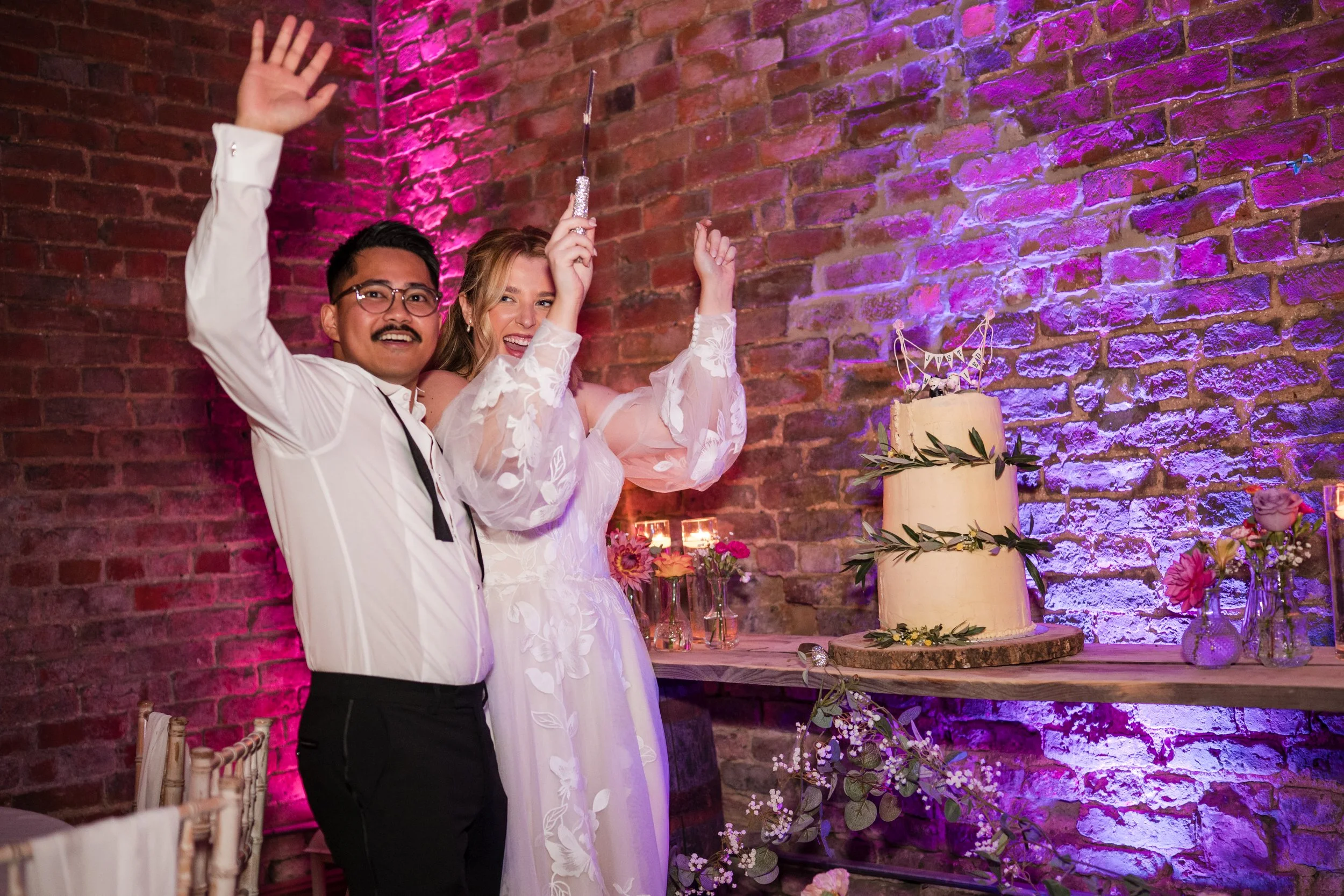 Bride and Groom cake cutting_The Barn at Morleys hall.jpg
