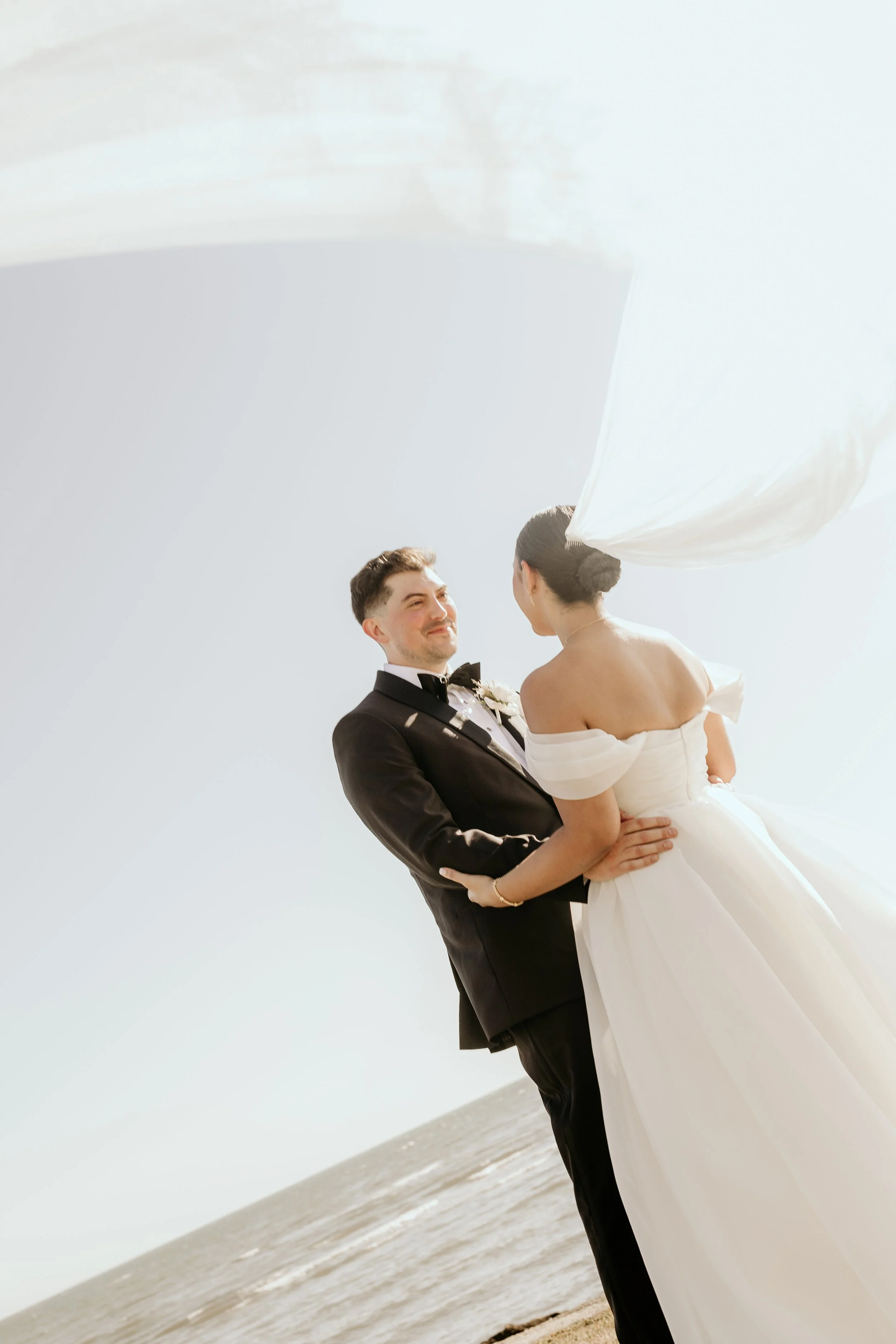 blue ocean views, coastal wedding, bride and groom 