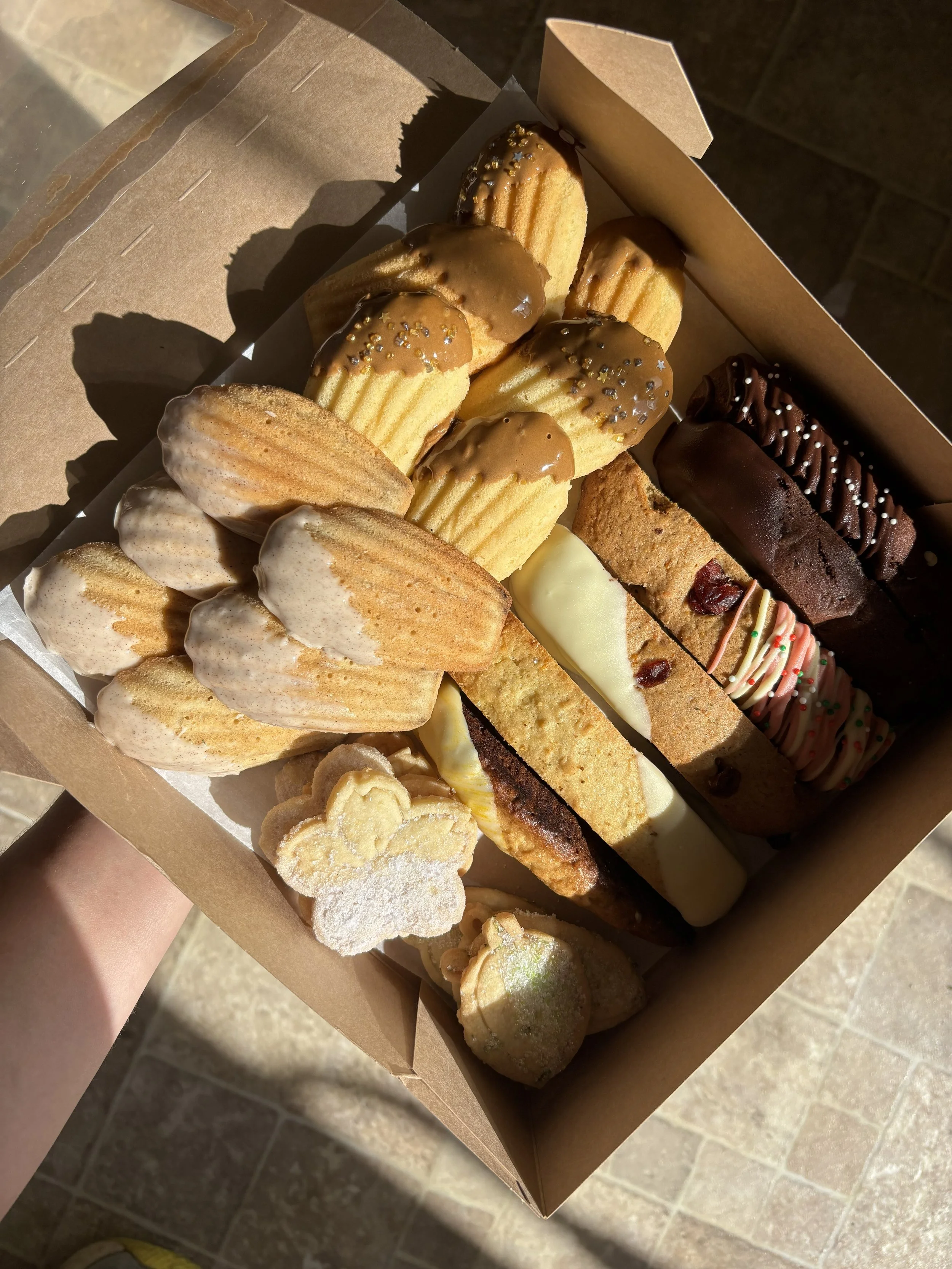 fancy cookie assortment: madeleines, shortbreads, biscottis