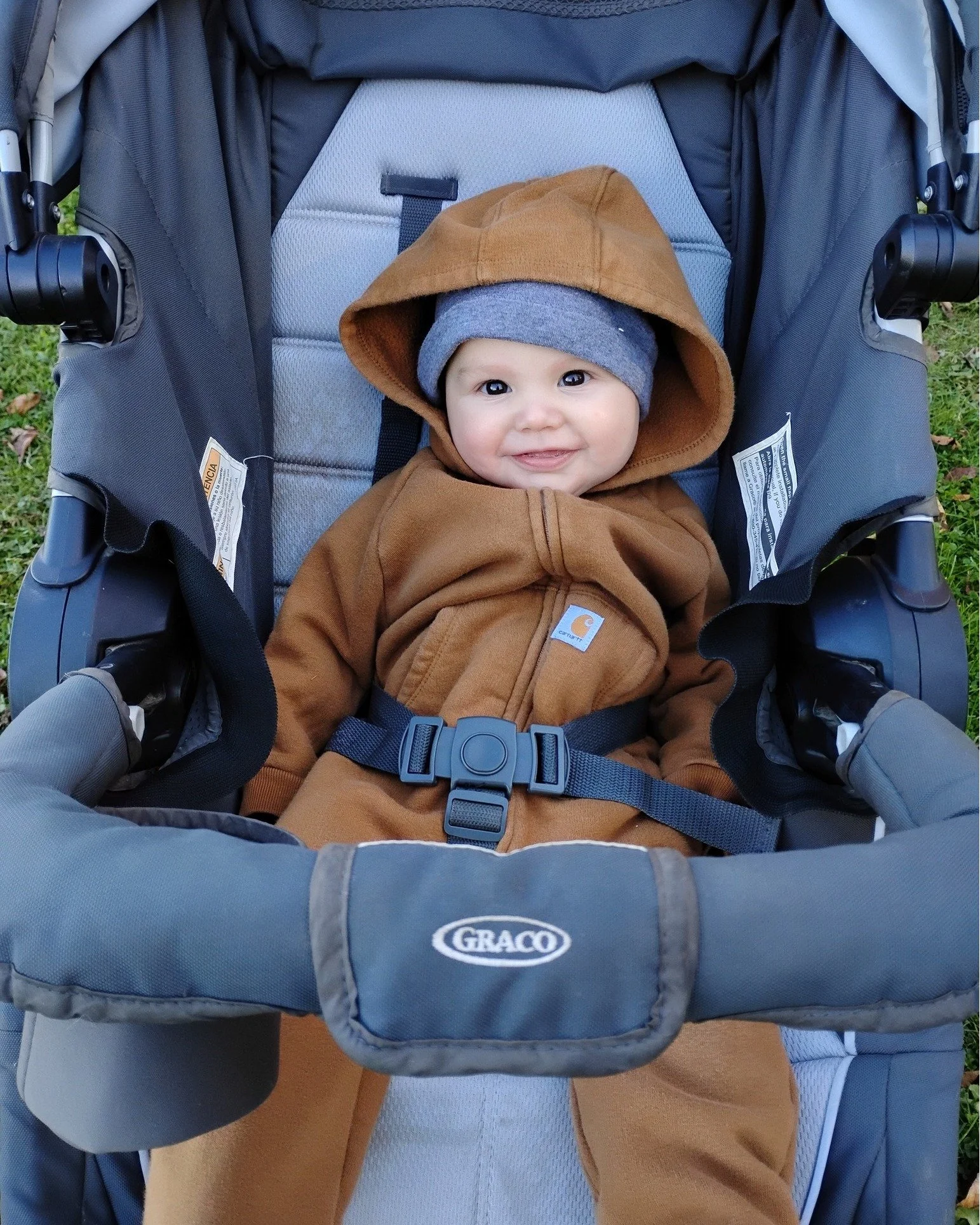 So we have this sweatshirt for the baby that my brother and sister in law got for kid #3 and it's my favorite piece of baby clothing. 

It has arms and legs.  The baby needs to be warm while everyone else runs around. The baby refuses to keep blanket