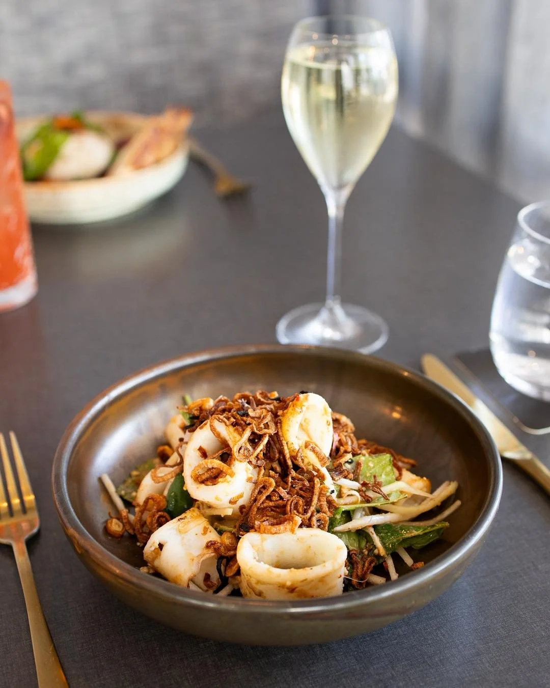Fresh, vibrant and just a little bit fiery 🌶️✨

Local squid, sweet papaya, crisp cucumber, a hit of chilli, crunchy cashew and golden fried shallots.

It&rsquo;s light, zesty and packed with texture &mdash; the kind of dish that tastes like summer o