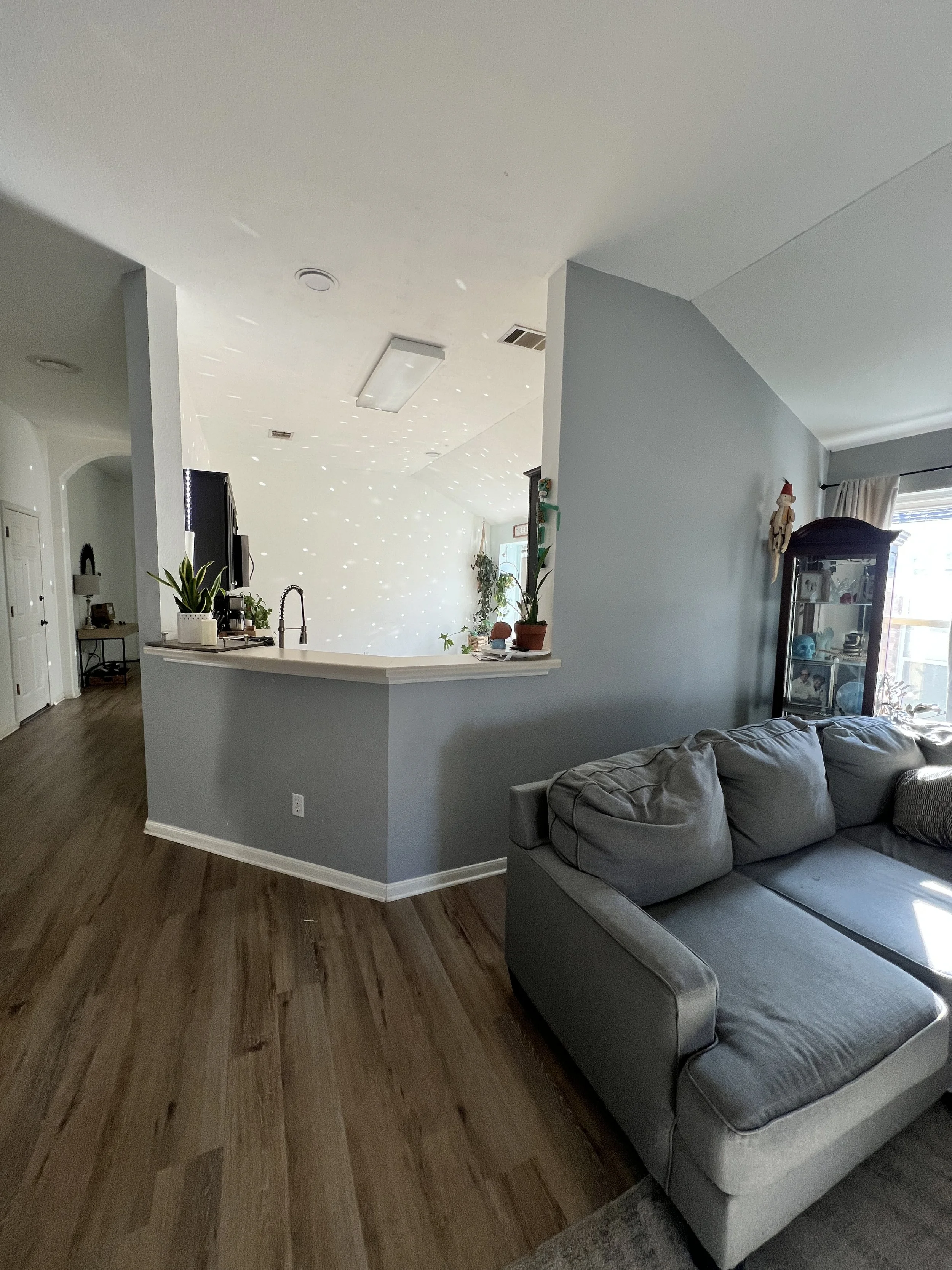 View into the kitchen from the large living room