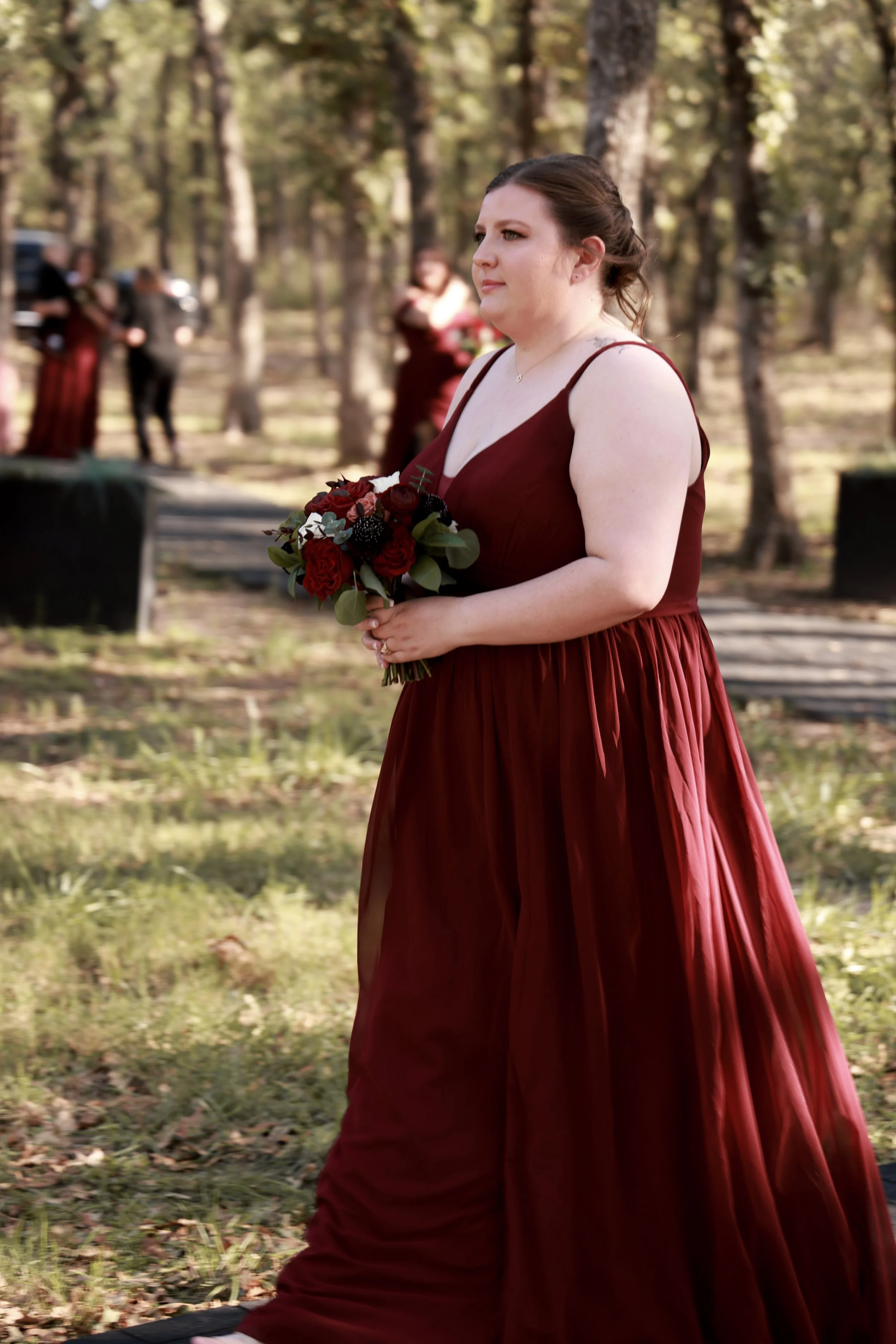 bridesmaid in burgundy dress