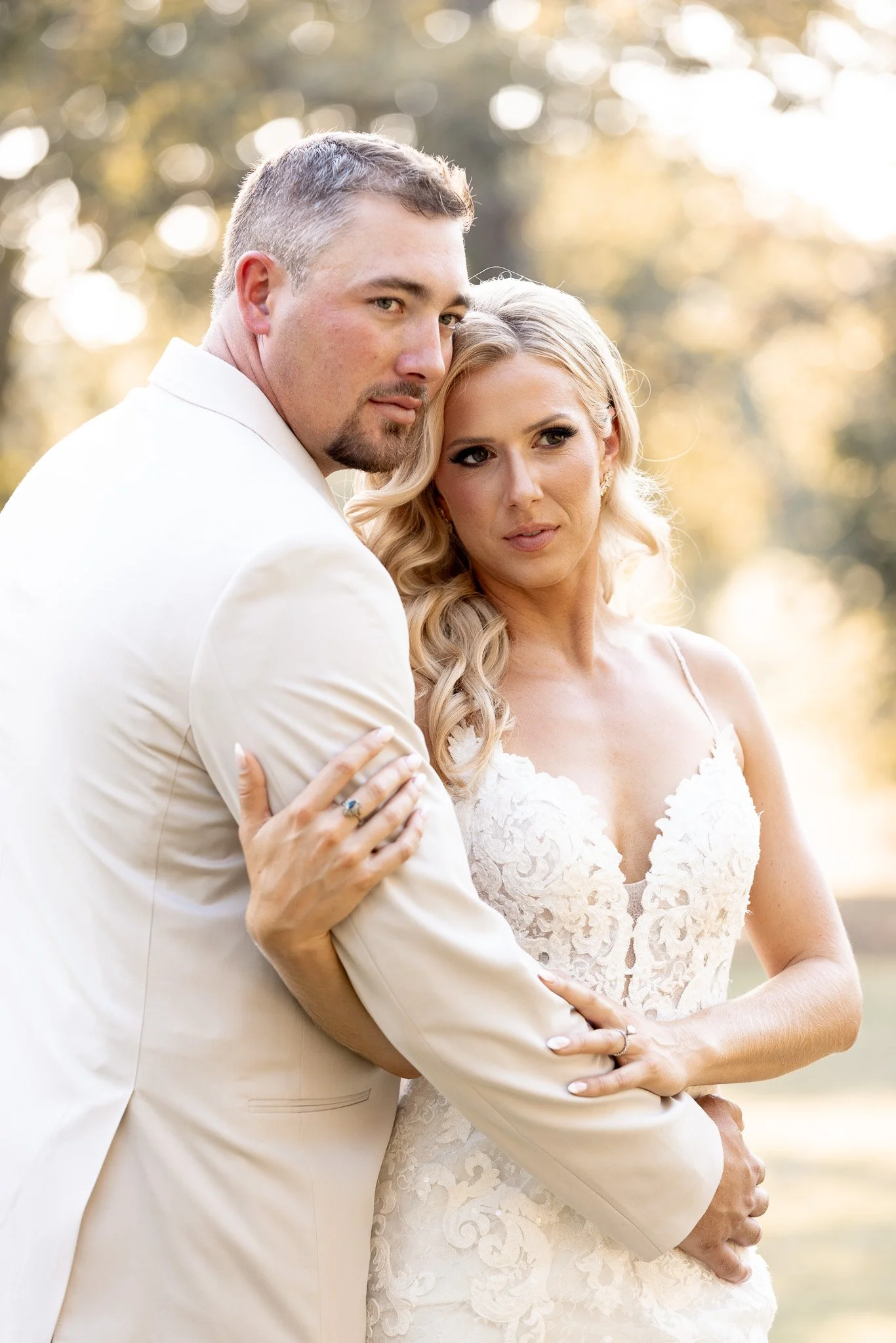 Bride and groom hugging each other