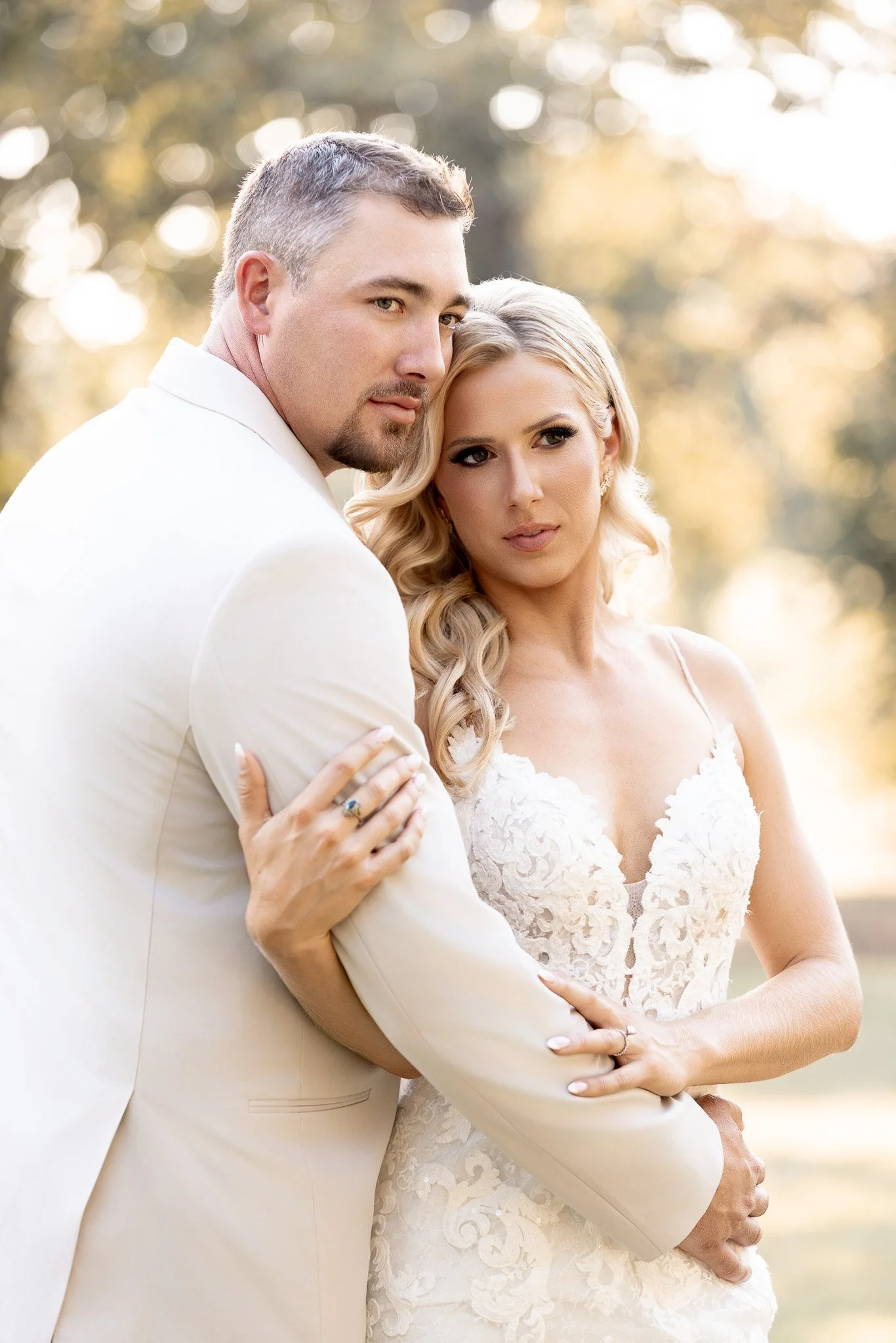Bride and groom hugging each other