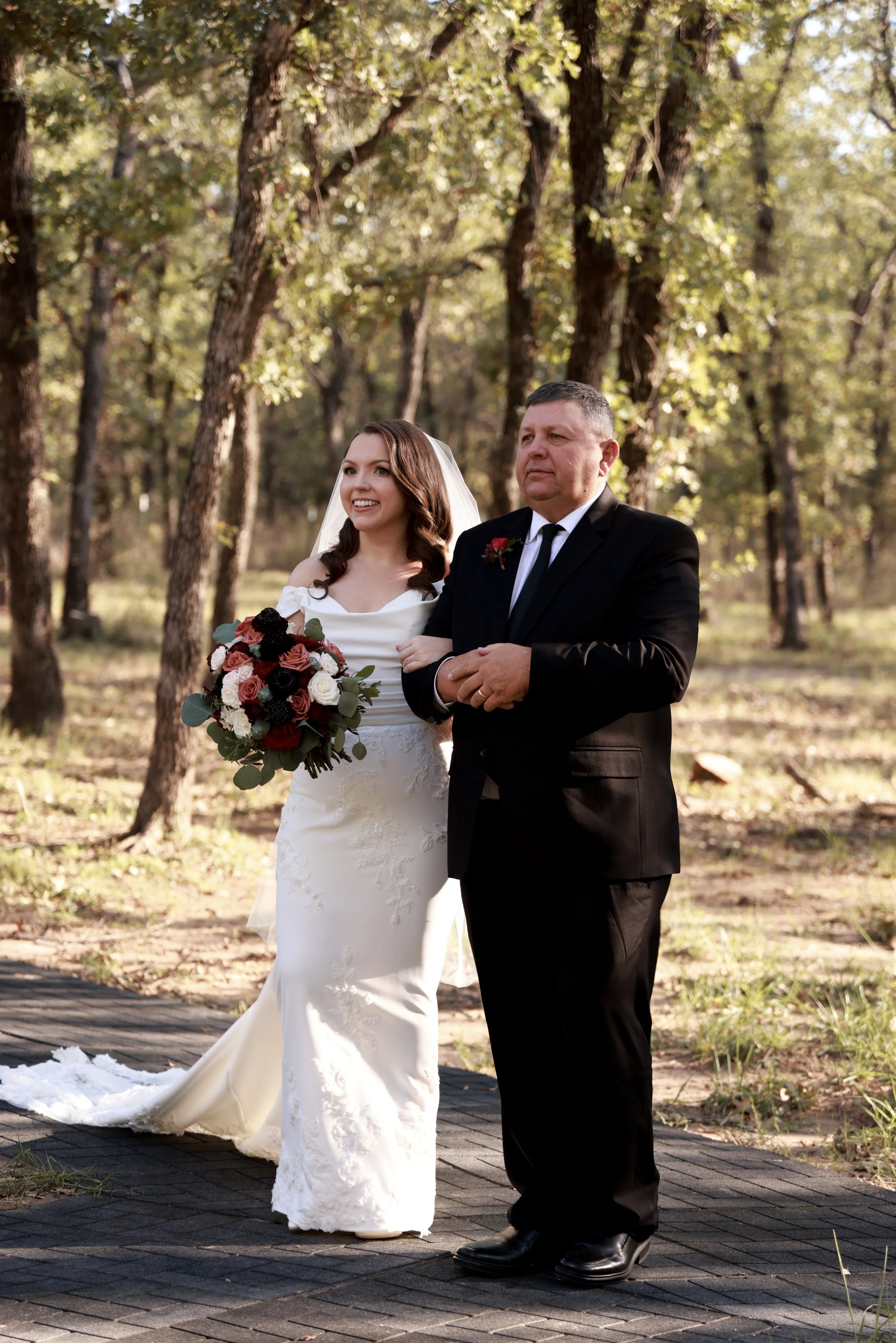 bride and her dad walking down the aisle