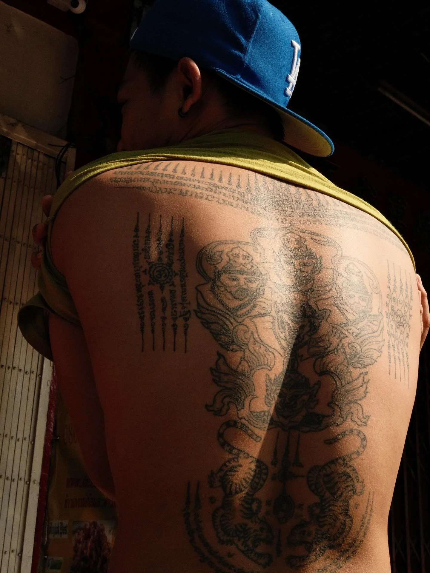 Bangkok ink ✍️🖤

3 of these show Sak Yant, traditional Thai hand poked tattoos. The folks I spoke with were proud of their work, and were kind enough to share them with me.