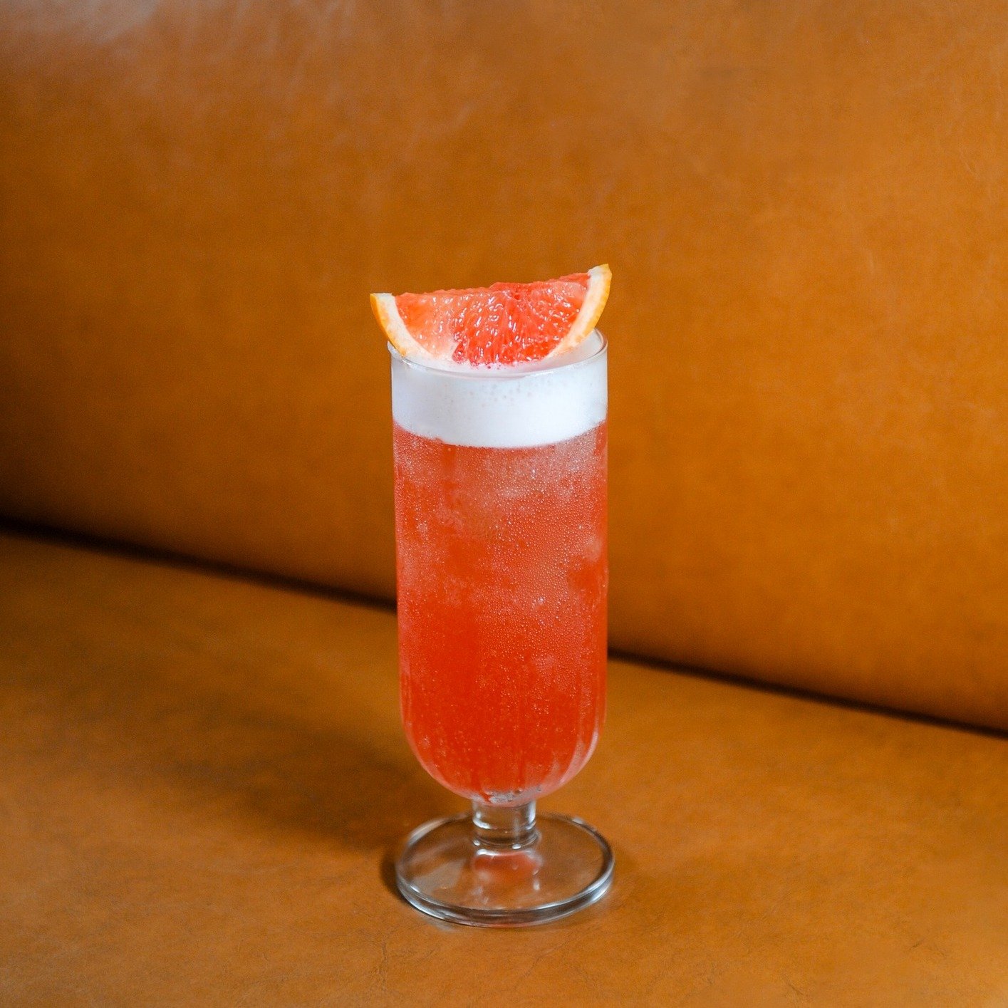 Spumoni - a classic cocktail with Japanese origins but with the iconic red Italian bitter, Campari, at its base. 

At Caffe Fernet, our Spumoni boasts the beautiful rosy hue and the pleasantly bitter backbone is balanced with grapefruit juice and a s