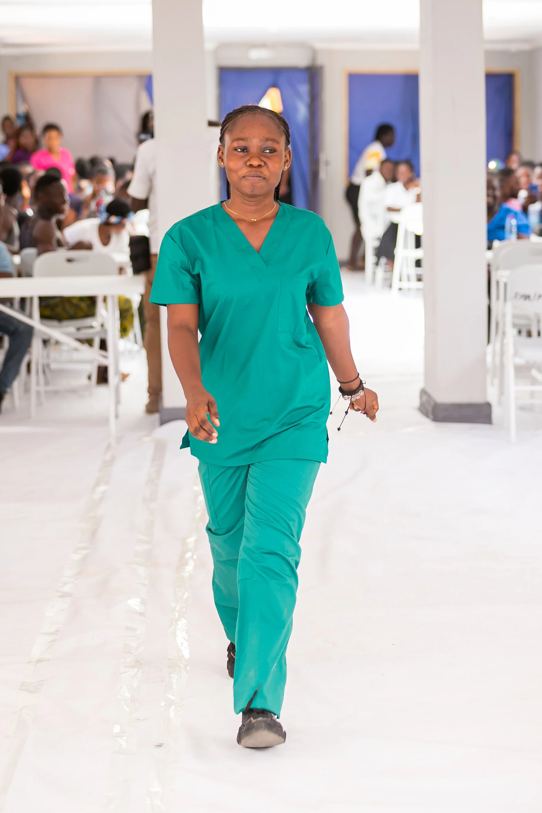 Employees model Maagrace products at a company fashion show